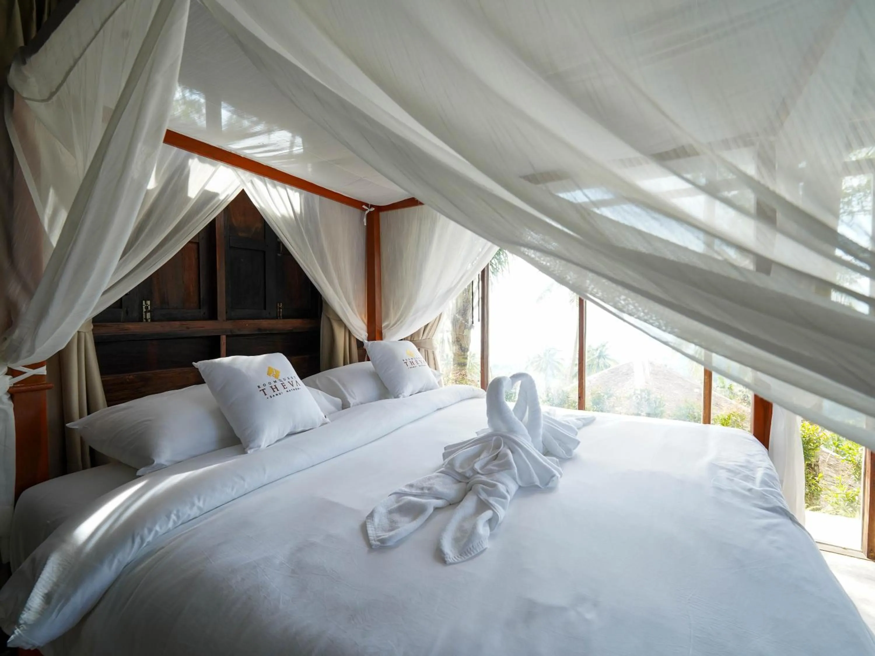 Bed in RoomQuest THEVA Resort Koh Samui