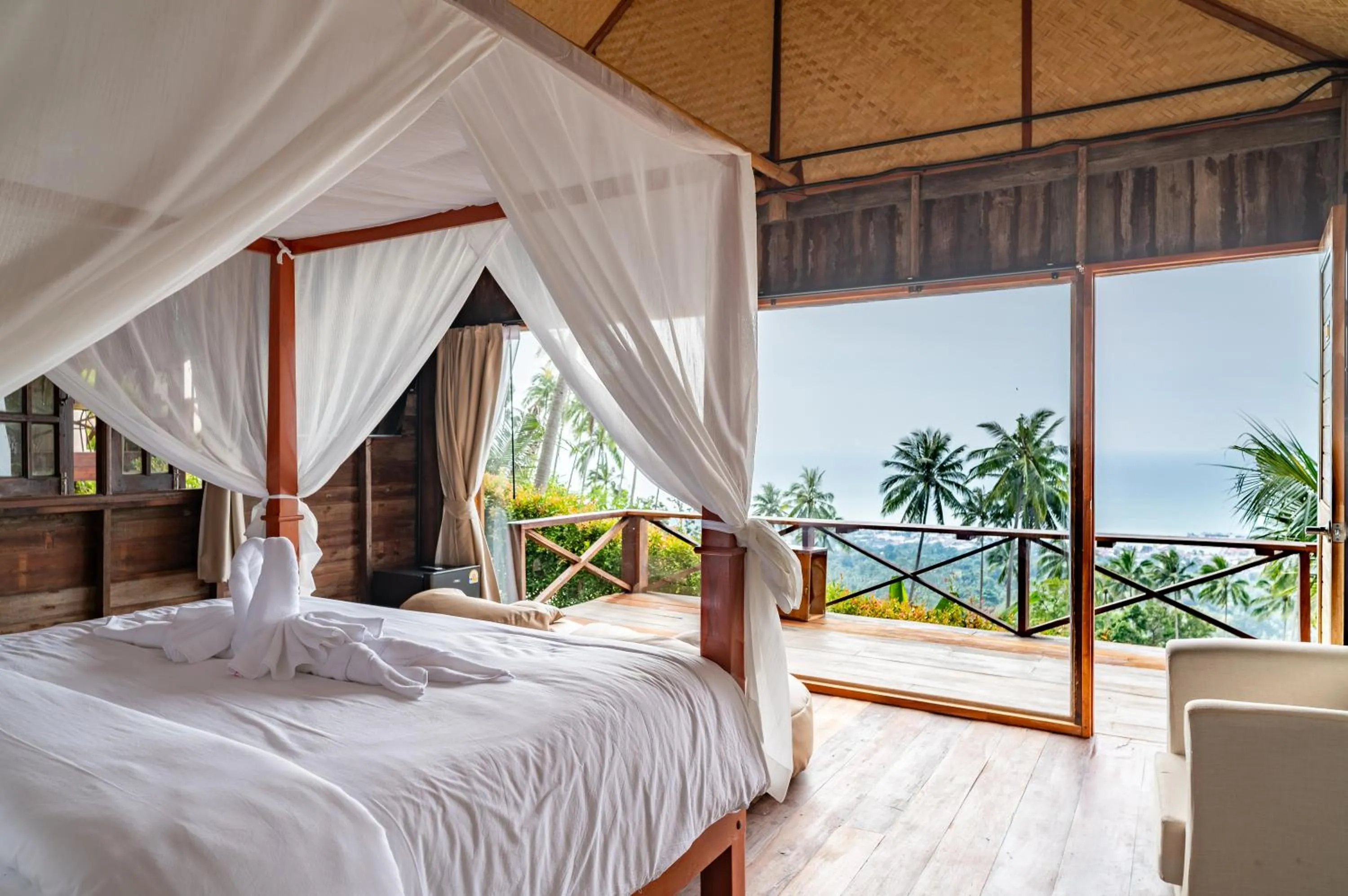 Bed in RoomQuest THEVA Resort Koh Samui