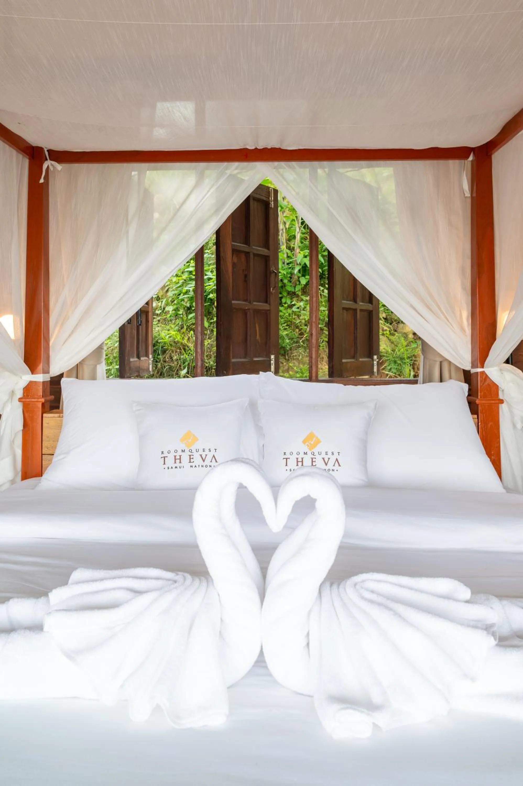 Bed in RoomQuest THEVA Resort Koh Samui