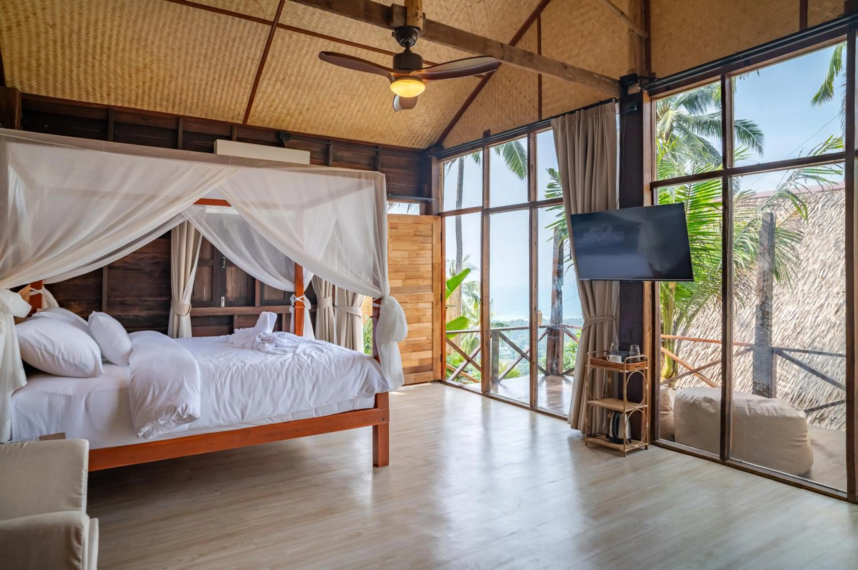 Bed in RoomQuest THEVA Resort Koh Samui