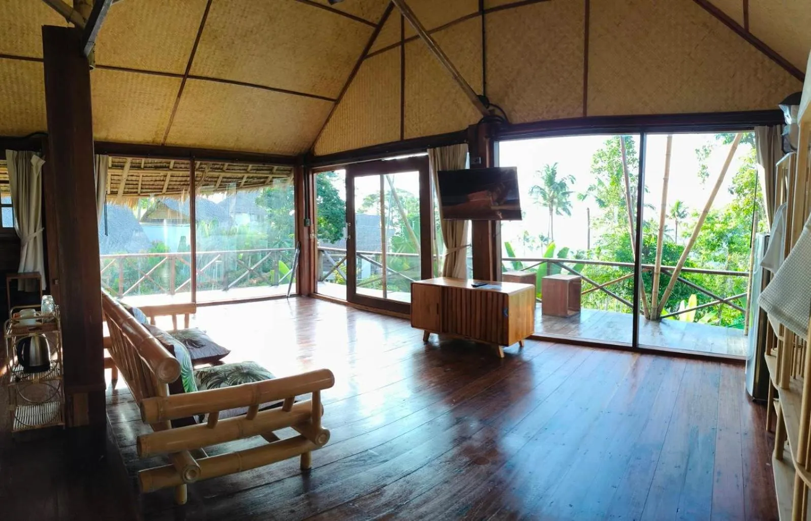 TV and multimedia in RoomQuest THEVA Resort Koh Samui