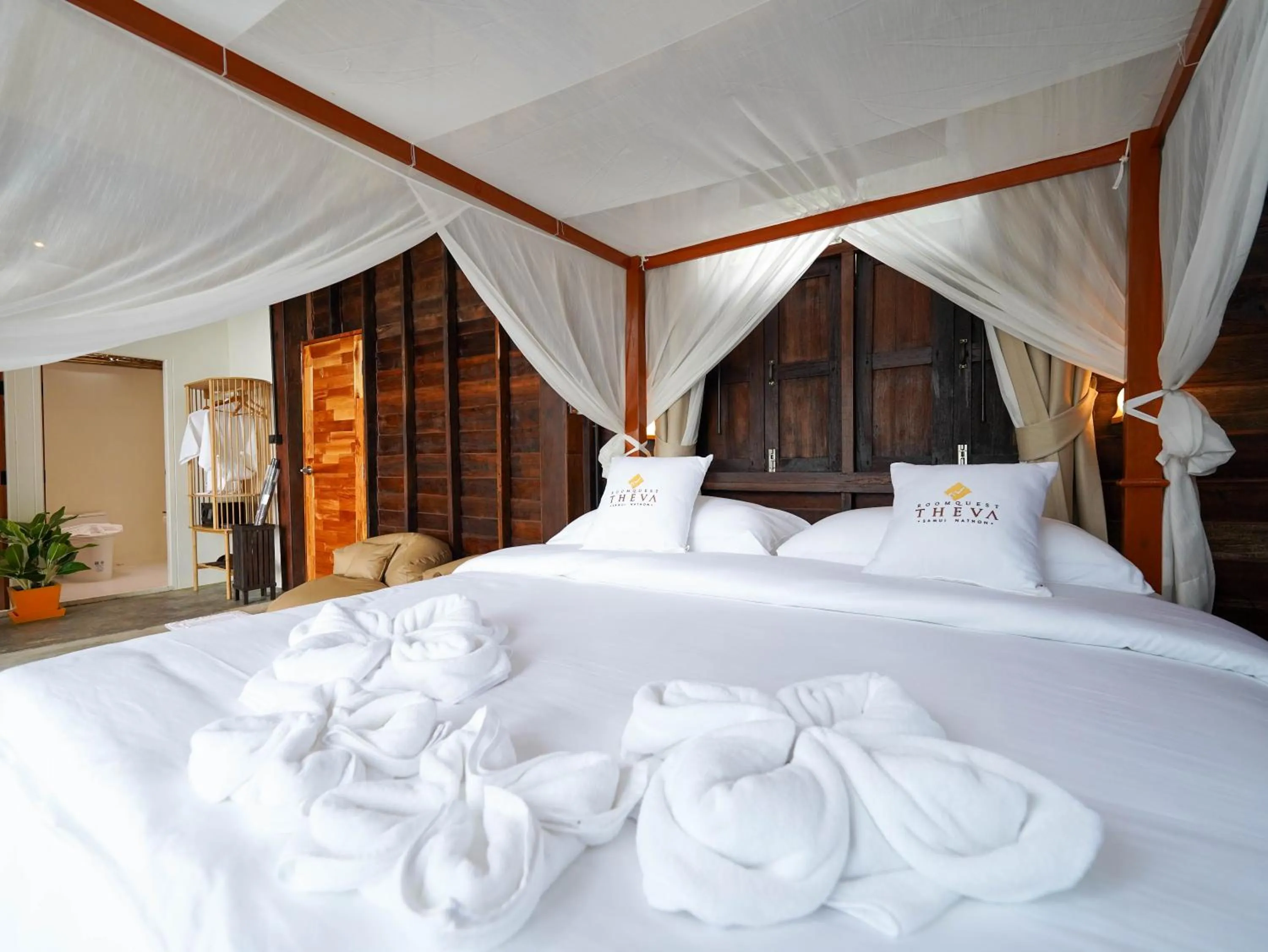 Bed in RoomQuest THEVA Resort Koh Samui