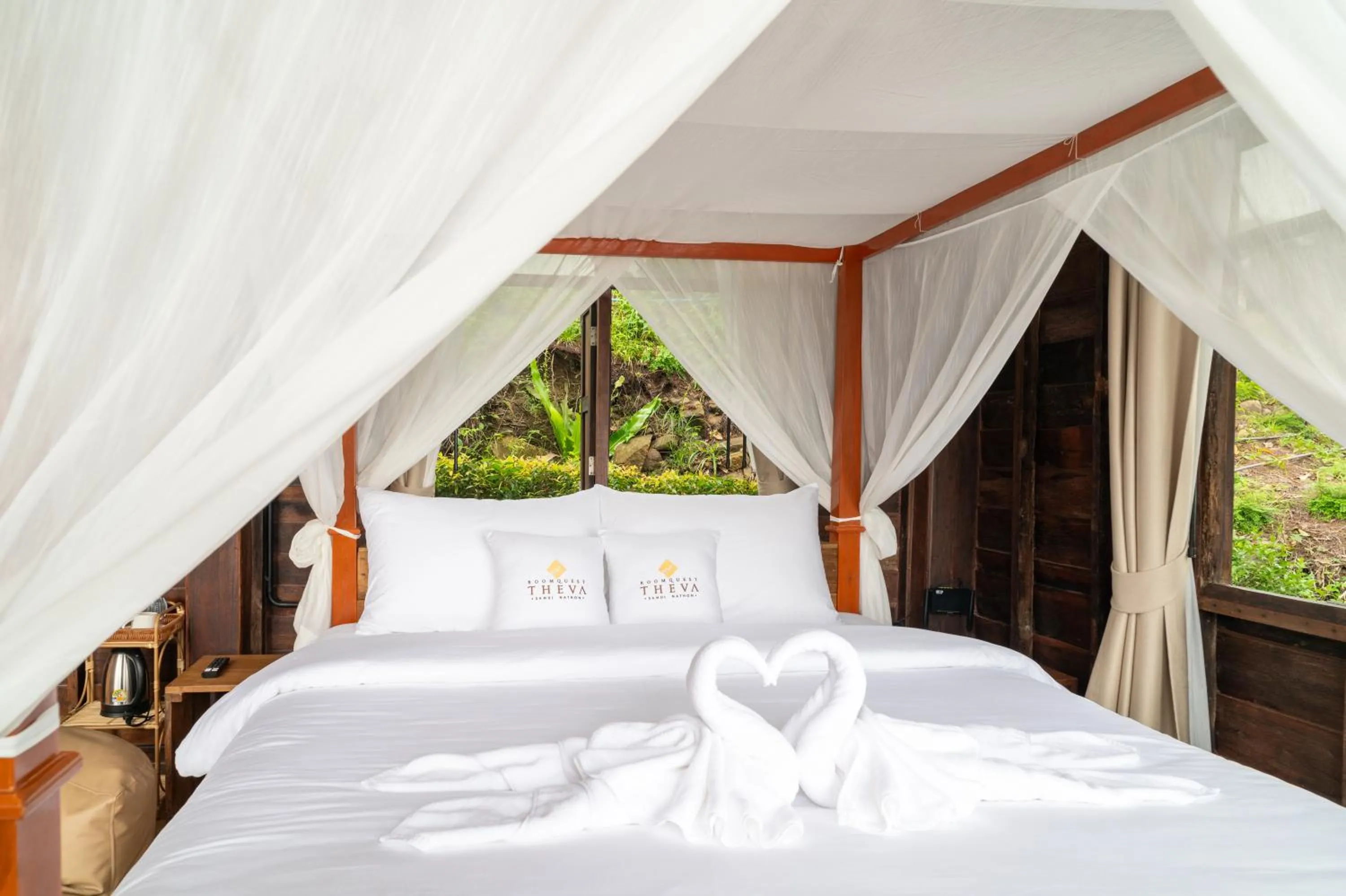 Bed in RoomQuest THEVA Resort Koh Samui