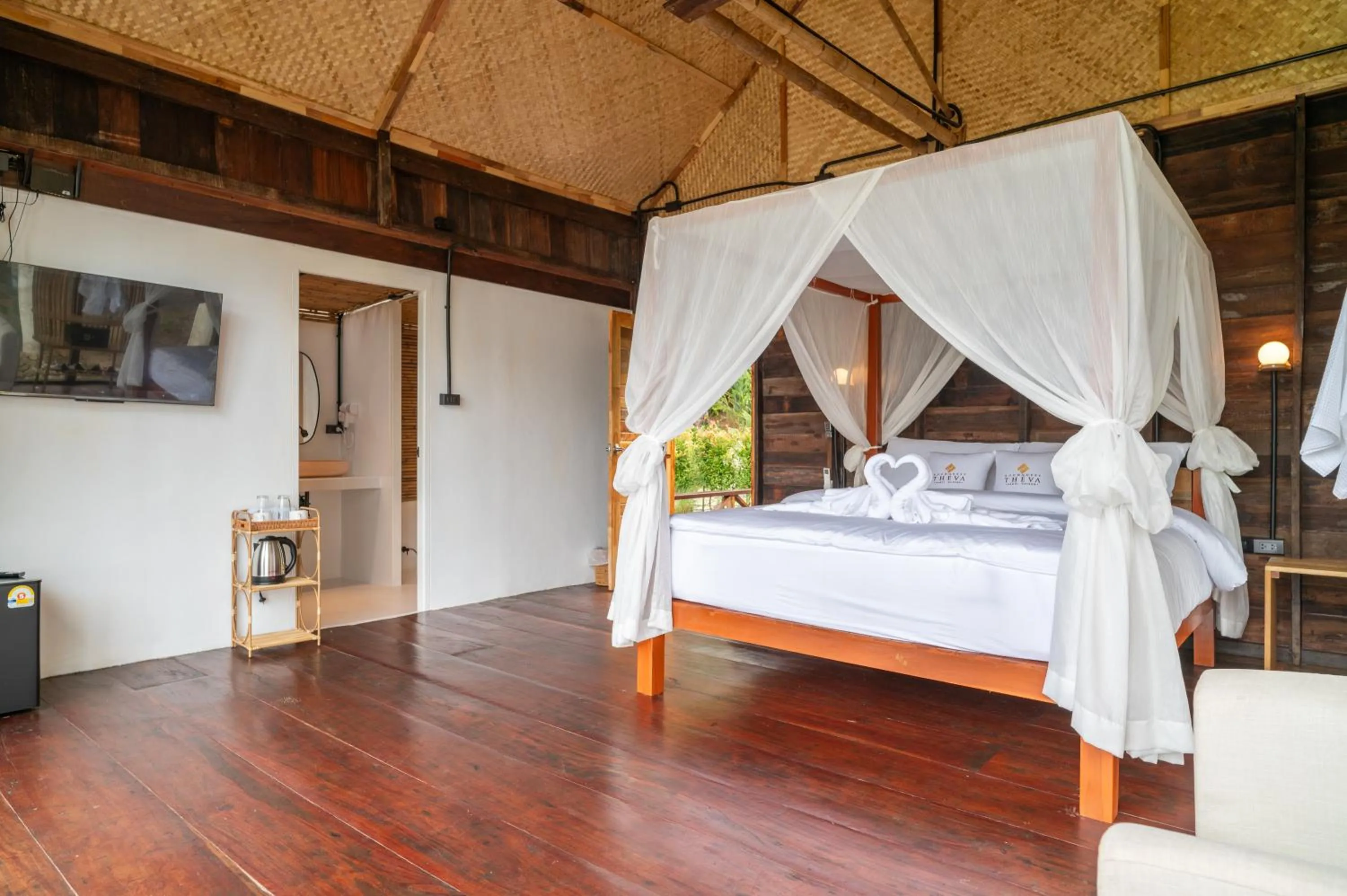 Bed in RoomQuest THEVA Resort Koh Samui