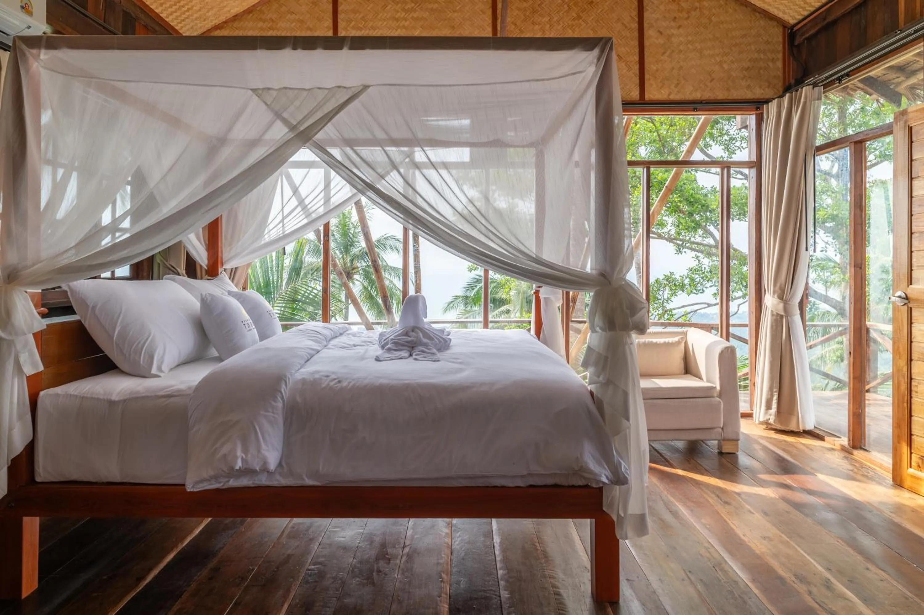 Bed in RoomQuest THEVA Resort Koh Samui