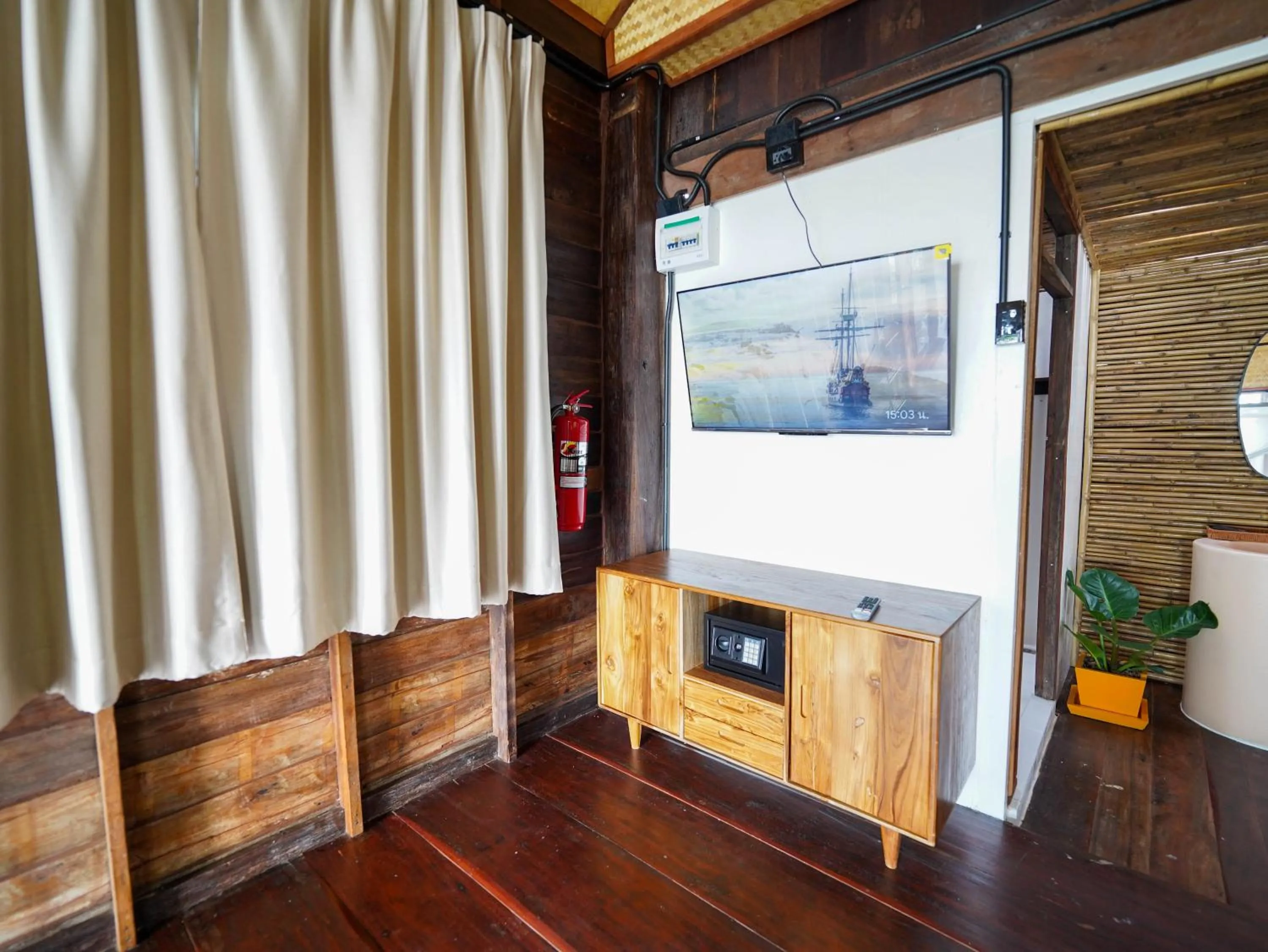 TV and multimedia in RoomQuest THEVA Resort Koh Samui