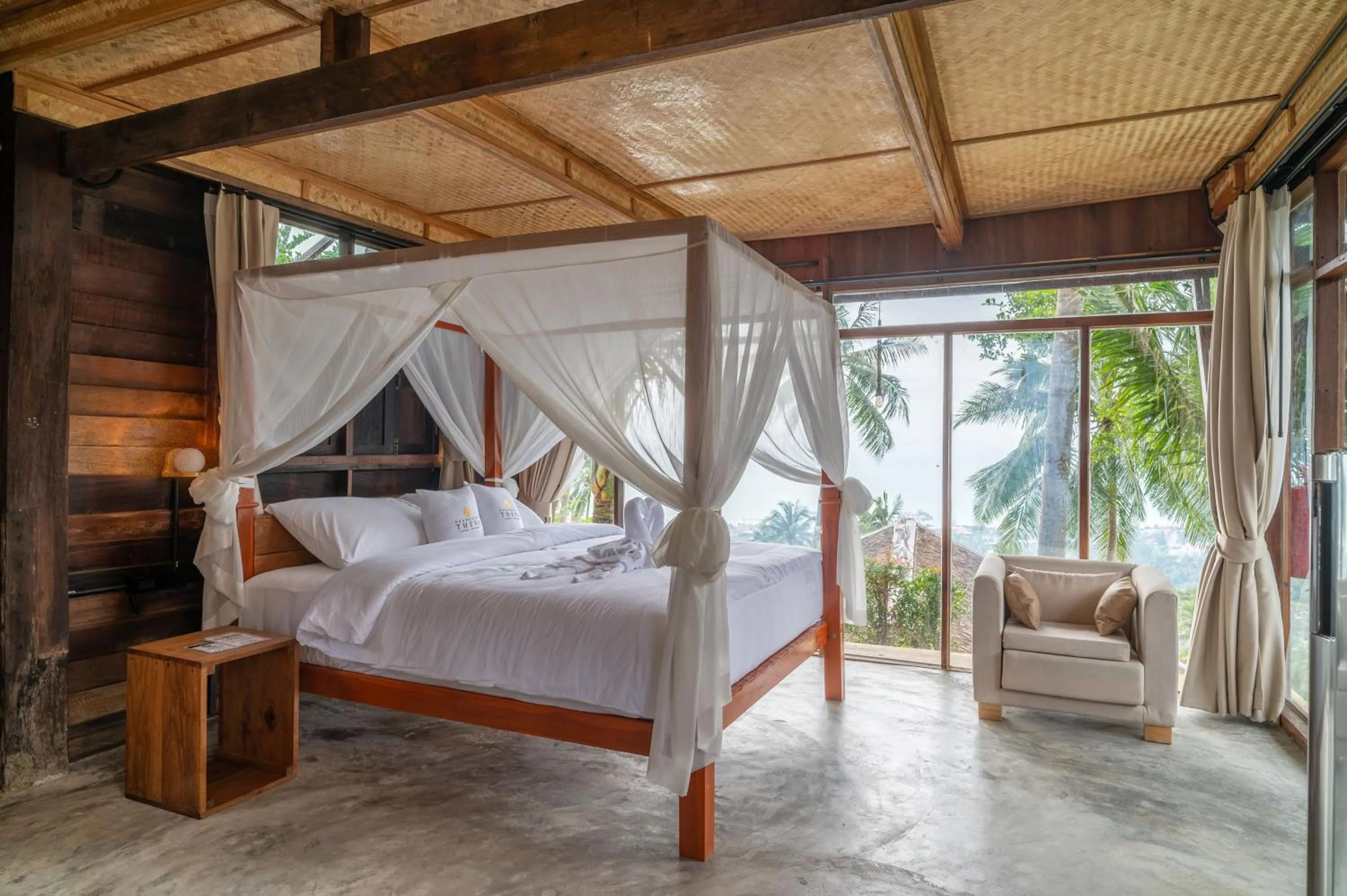 Bed in RoomQuest THEVA Resort Koh Samui