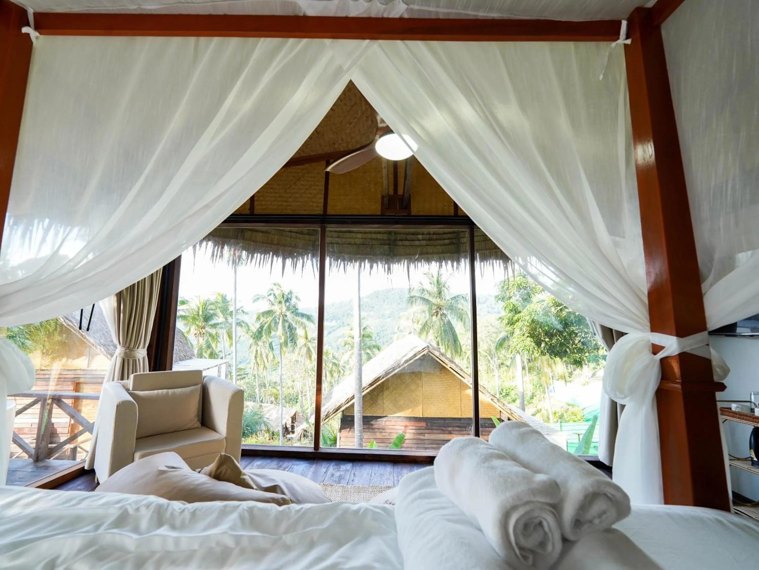 View (from property/room), Bed in RoomQuest THEVA Resort Koh Samui