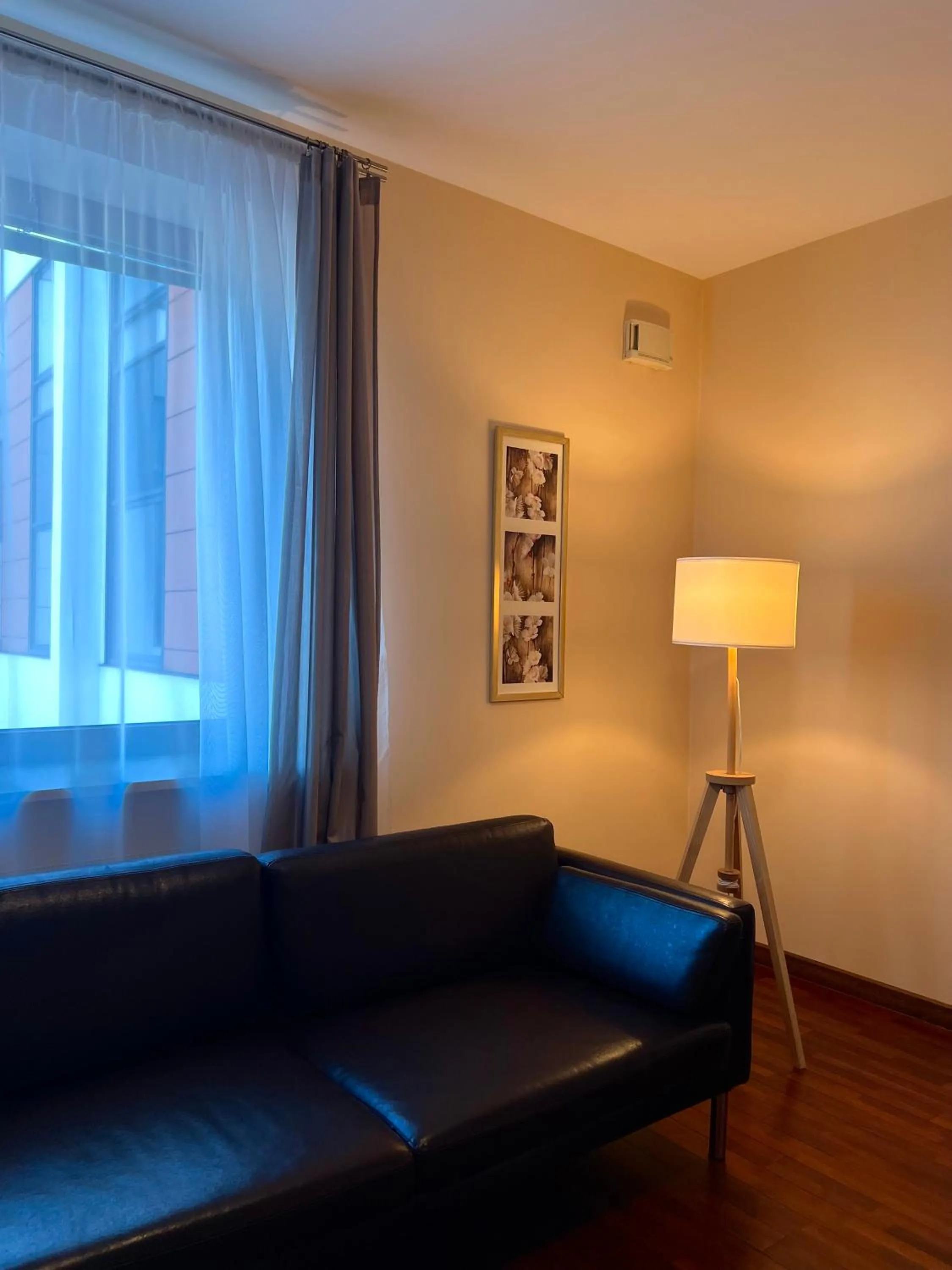 Living room in inQse Warsaw Centre