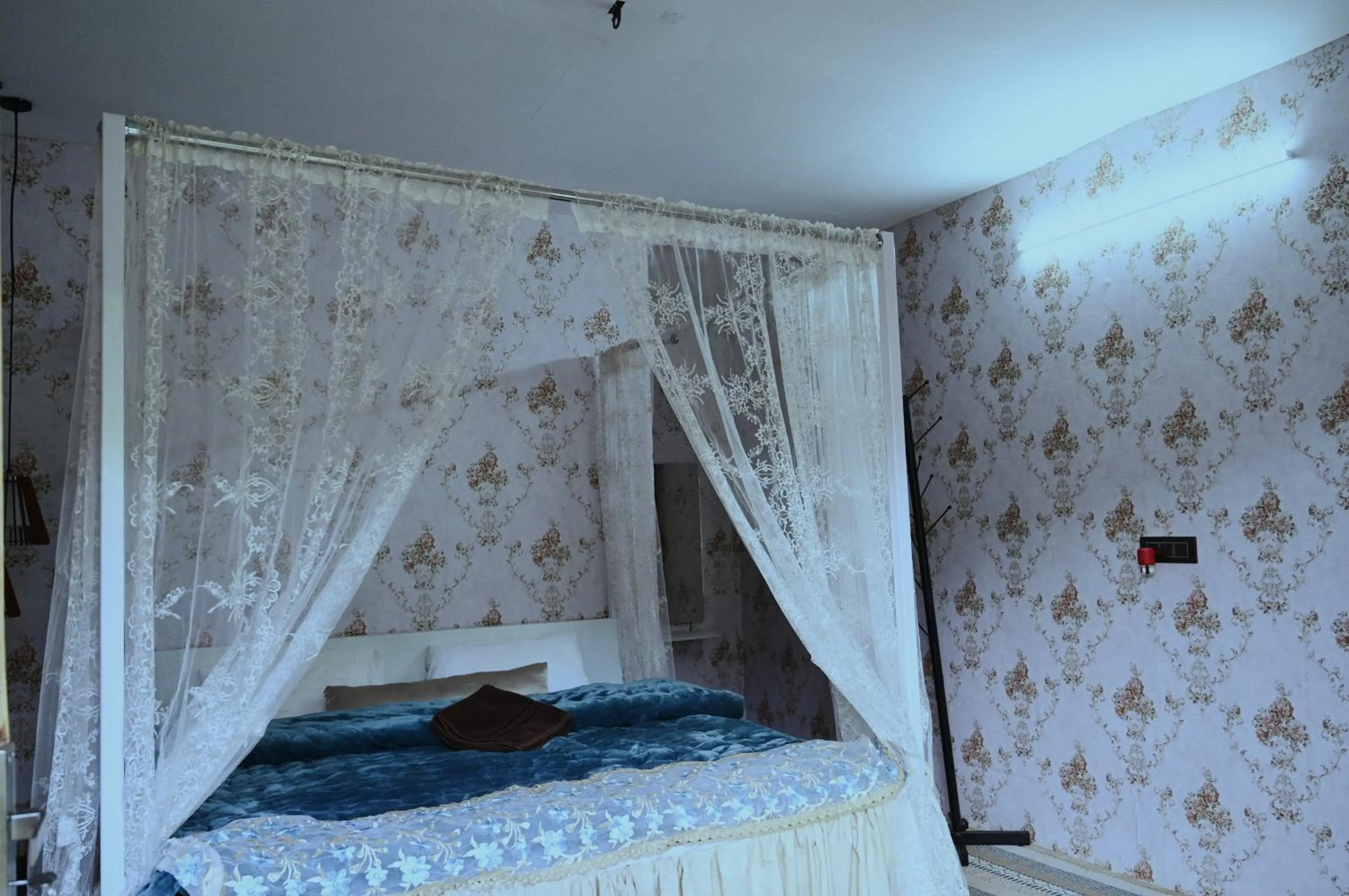 Bed in The Rare Ones, Bhalugaad Resort and game Zone