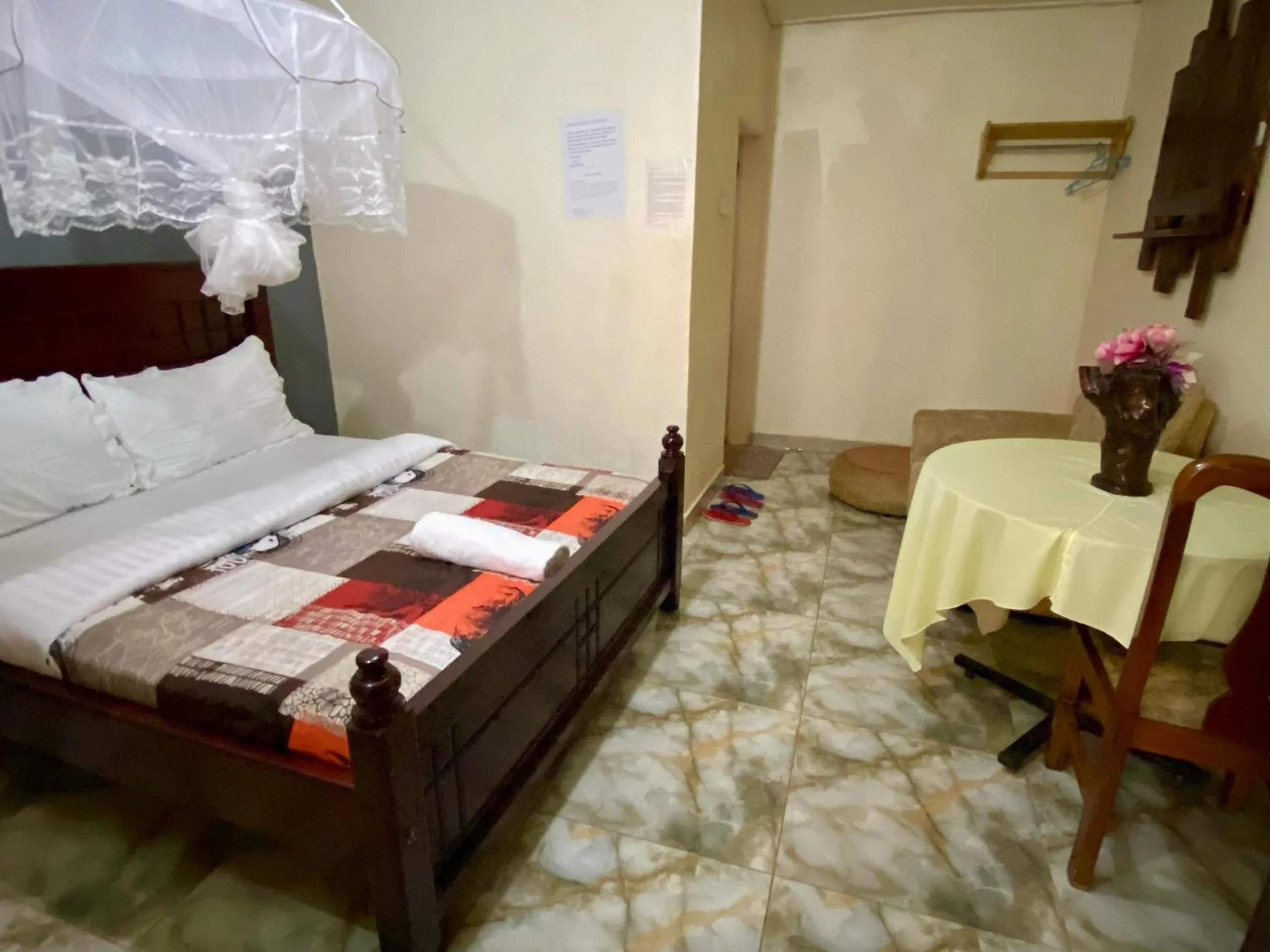 Bed in Gorilla African Guest House