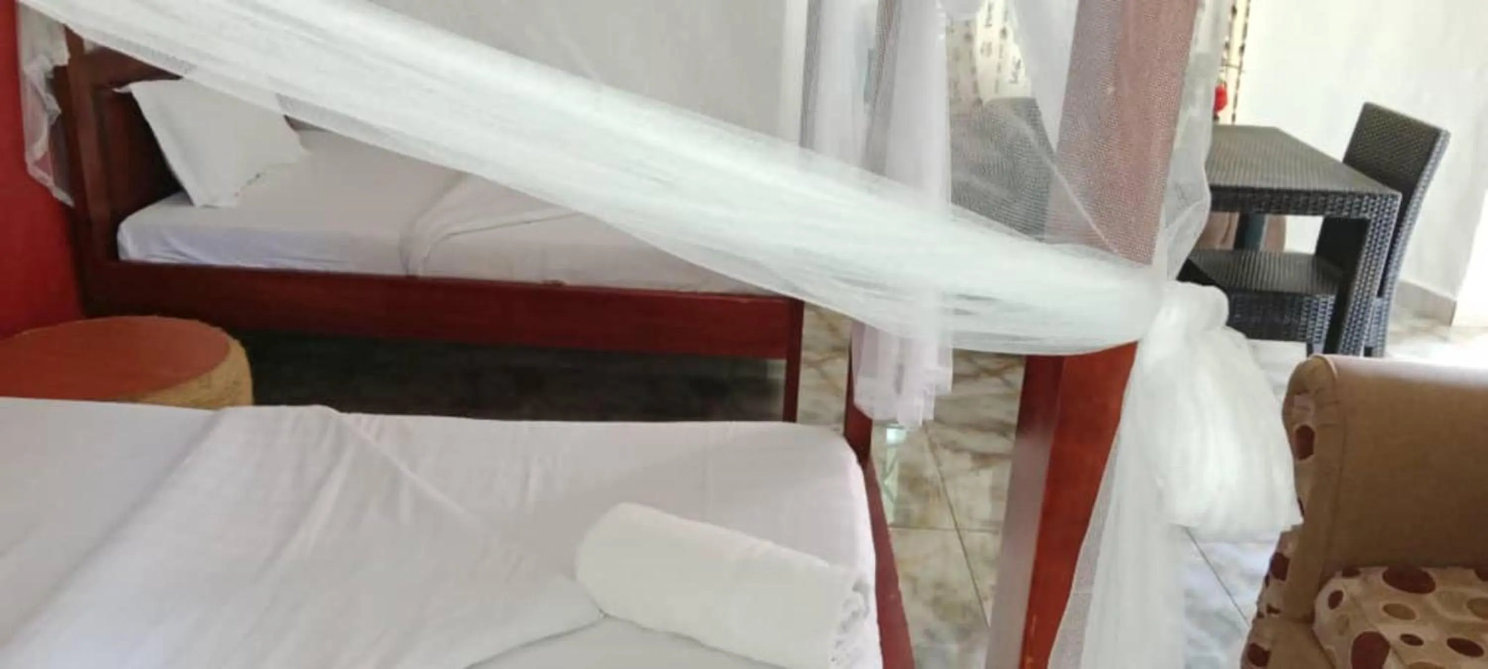 Bed in Gorilla African Guest House