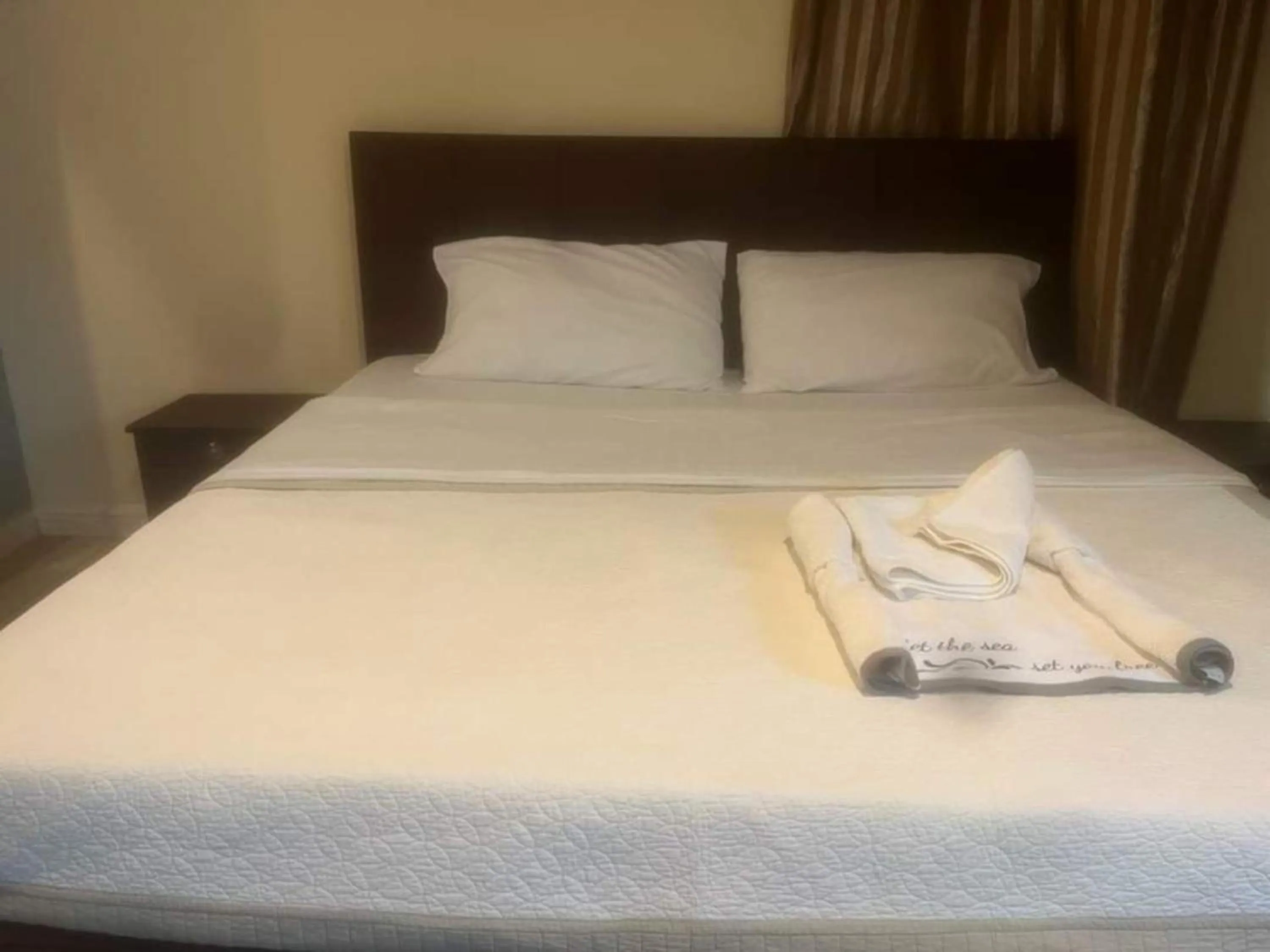 Bed in Gorilla African Guest House