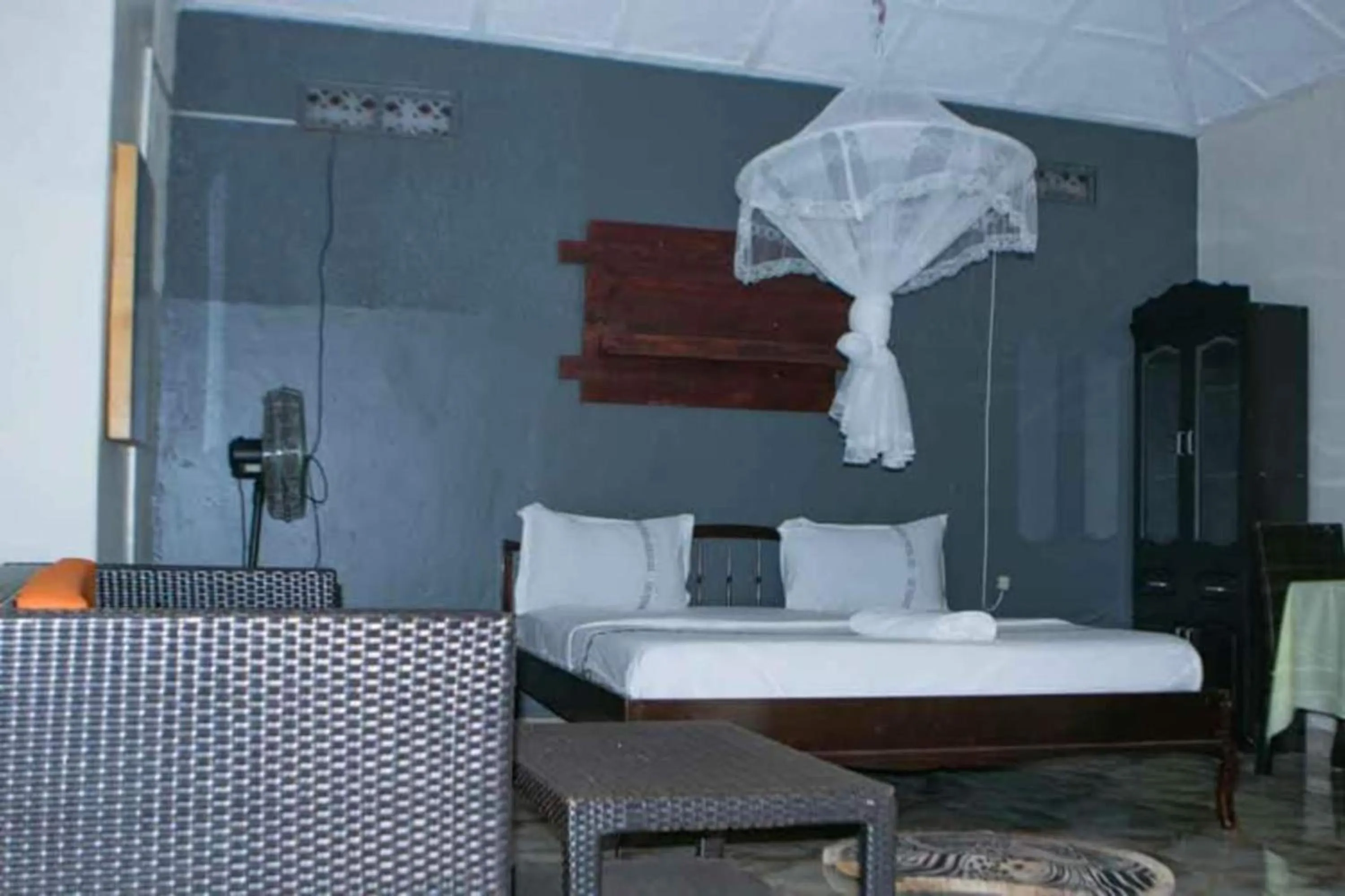 Bed in Gorilla African Guest House