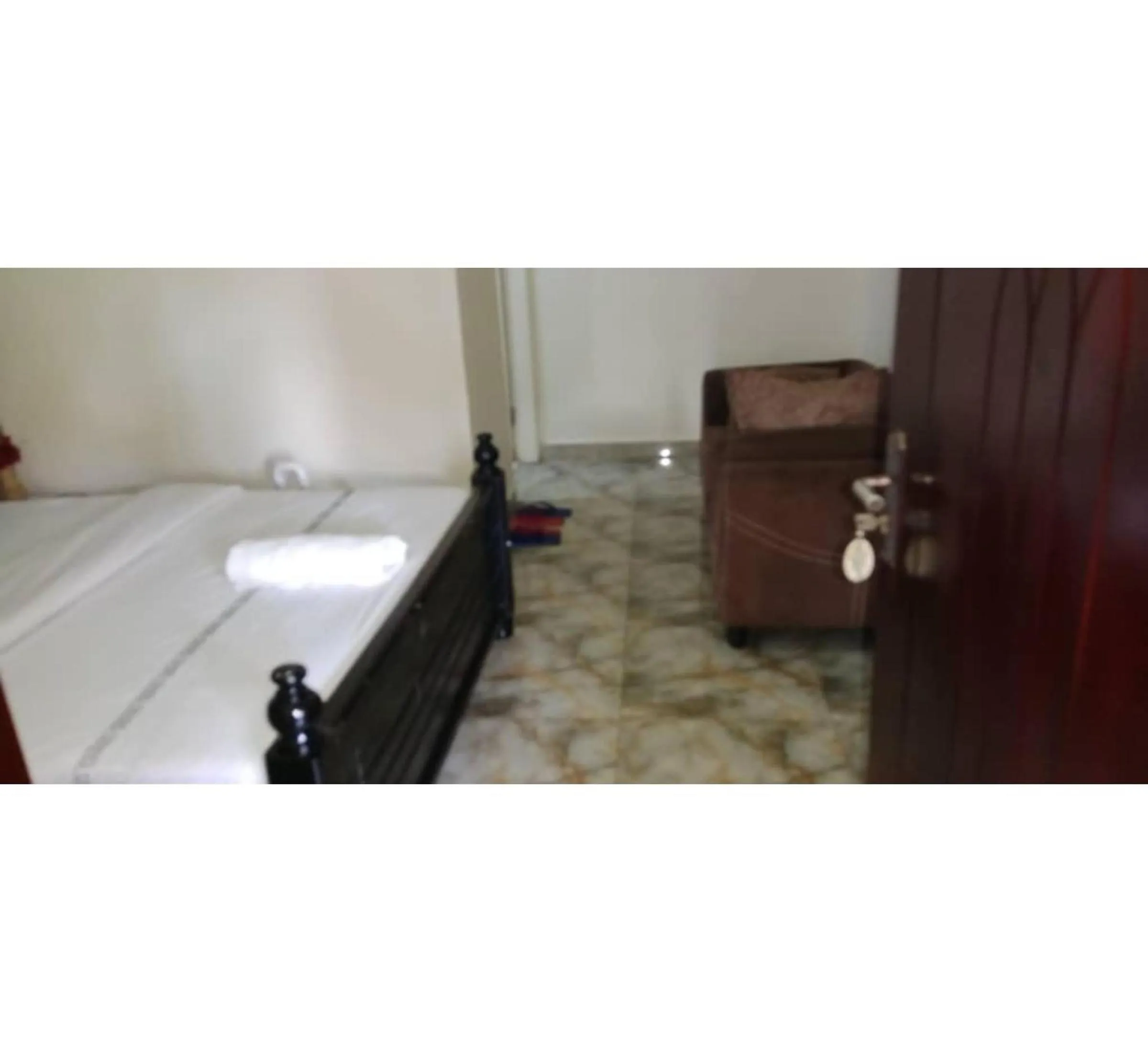 Bed in Gorilla African Guest House