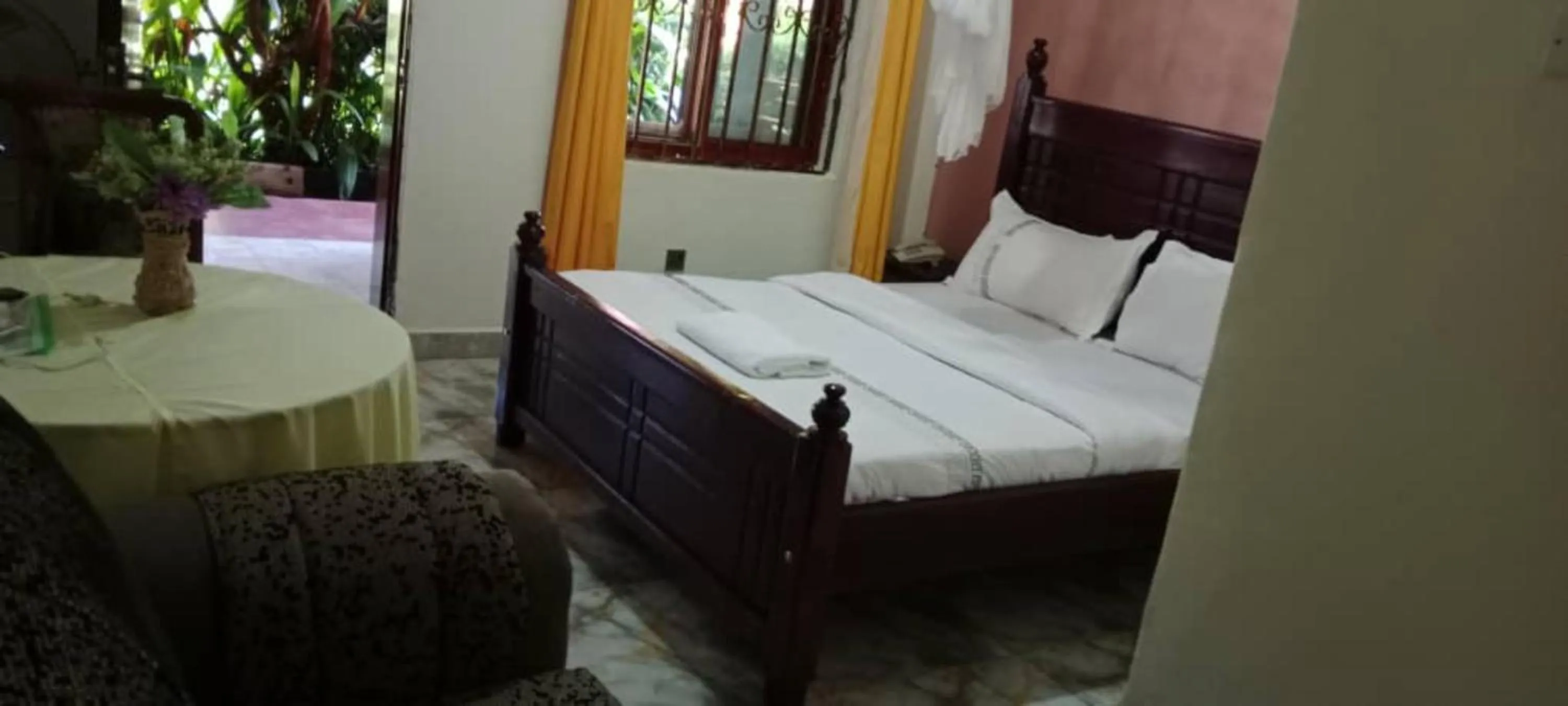 Bed in Gorilla African Guest House