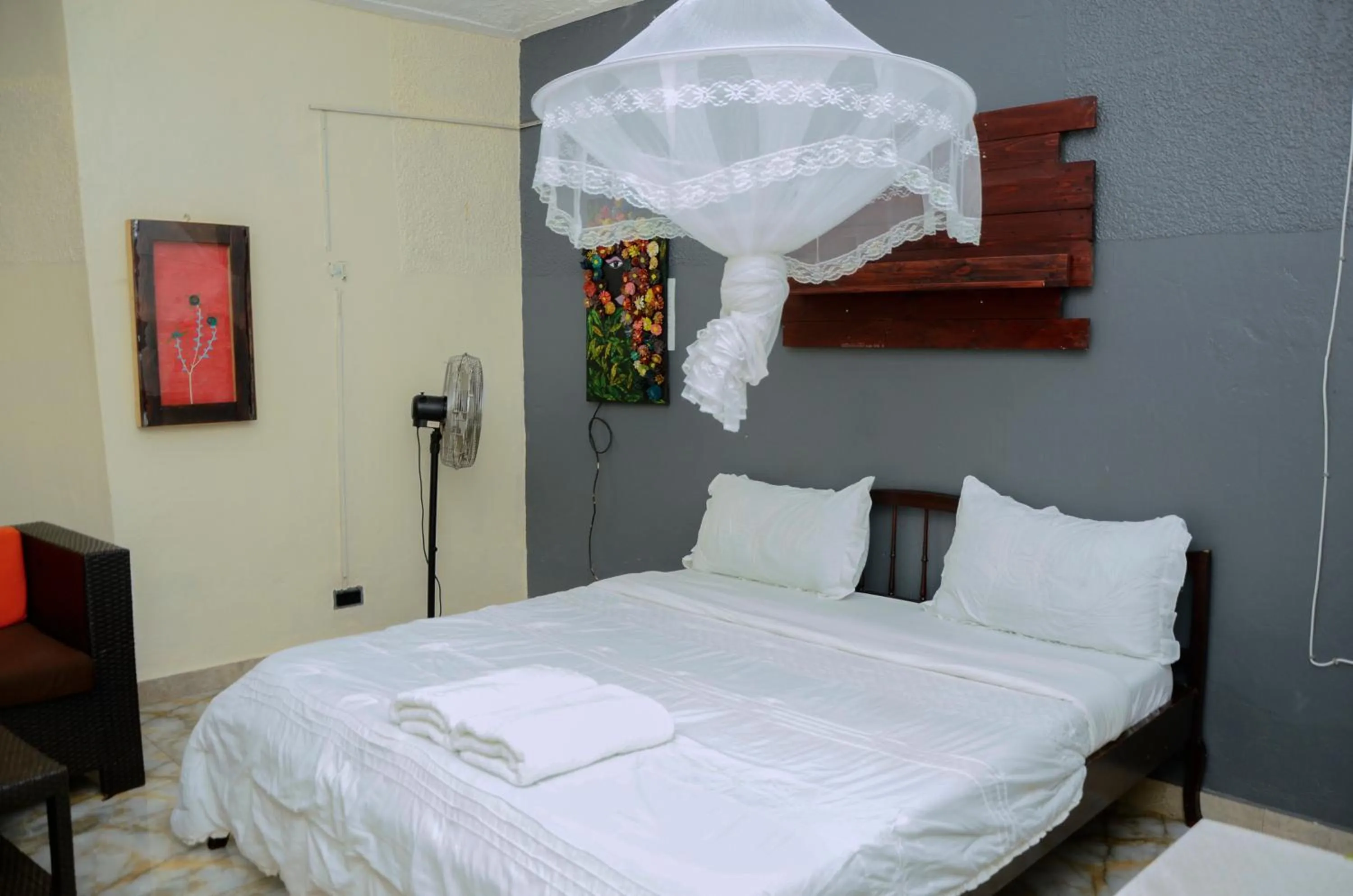 Bed in Gorilla African Guest House