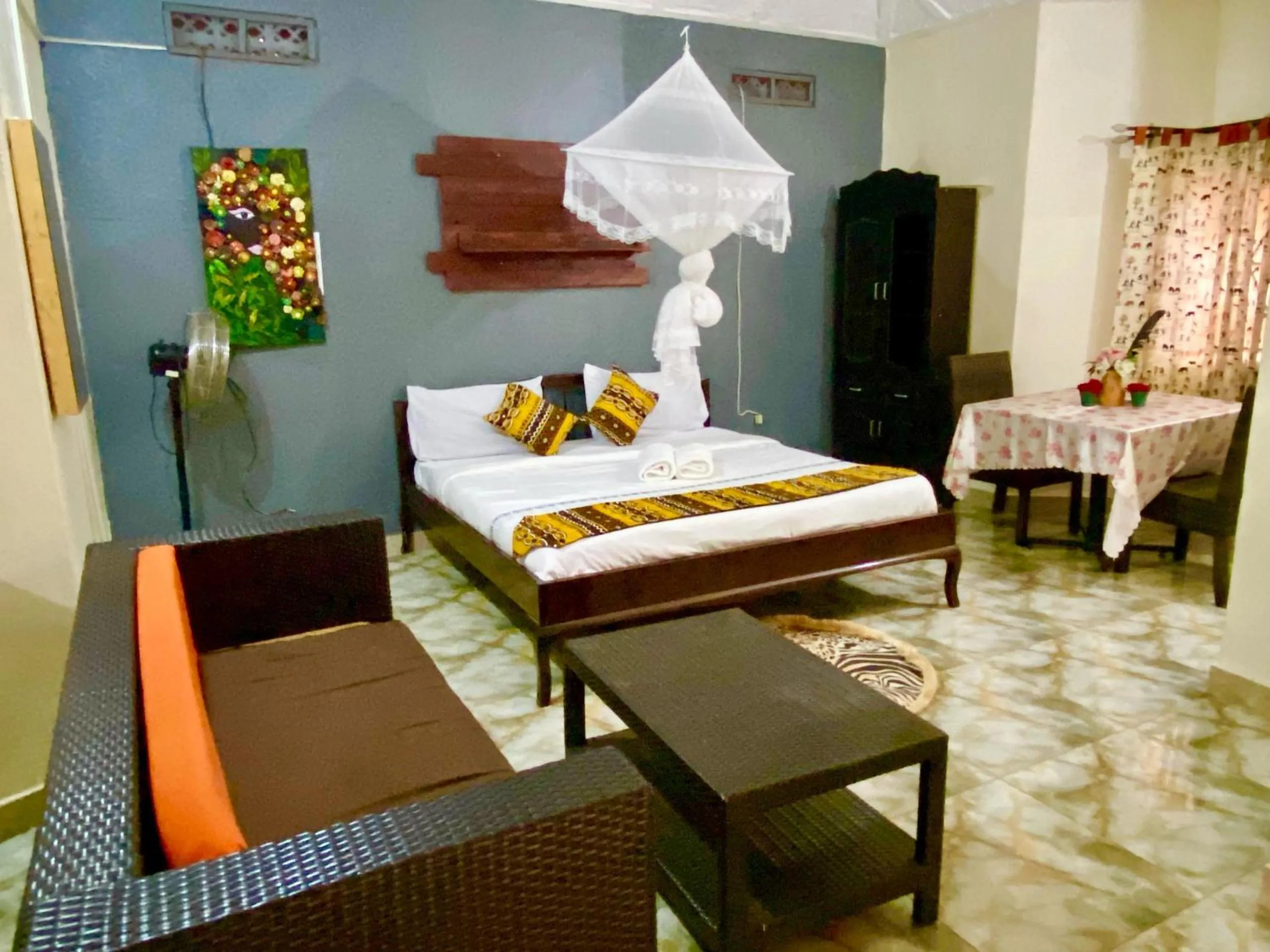 Bed in Gorilla African Guest House