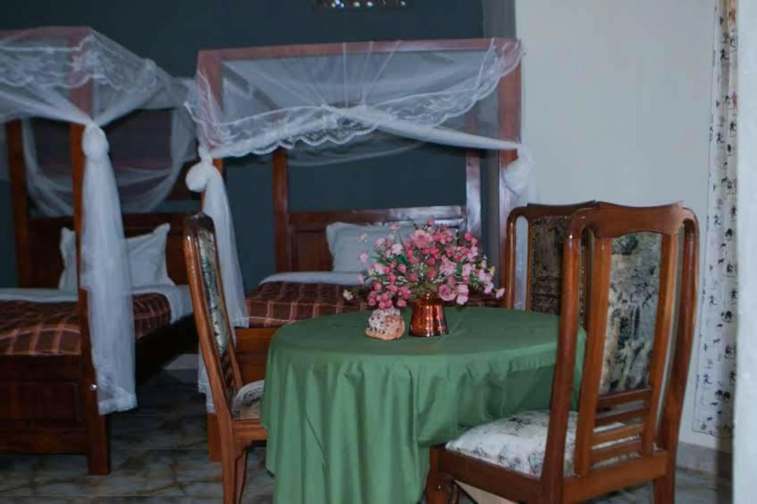 Bed in Gorilla African Guest House