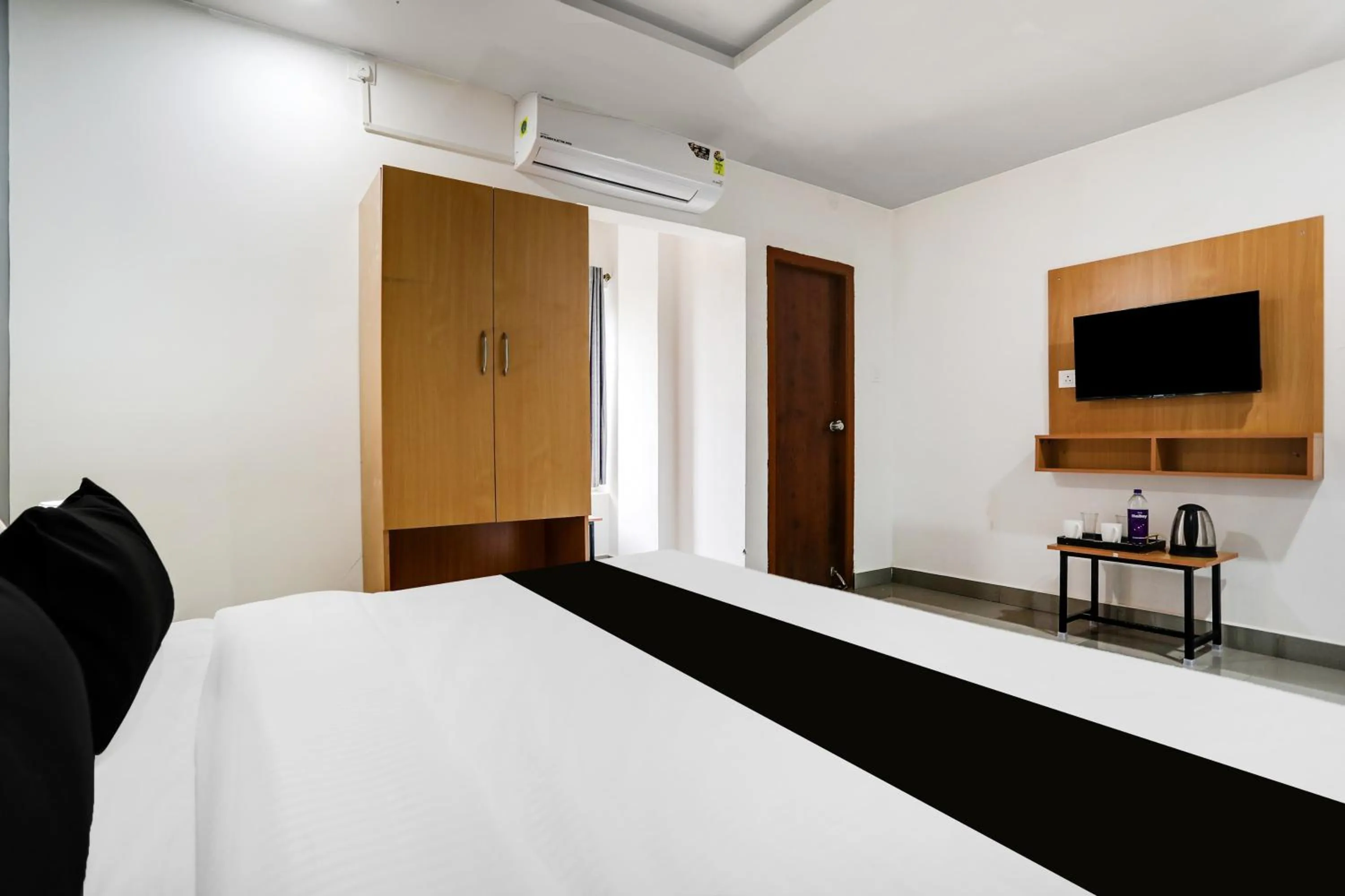 Bedroom, Bed in Super Townhouse Shamshabad Near Airport