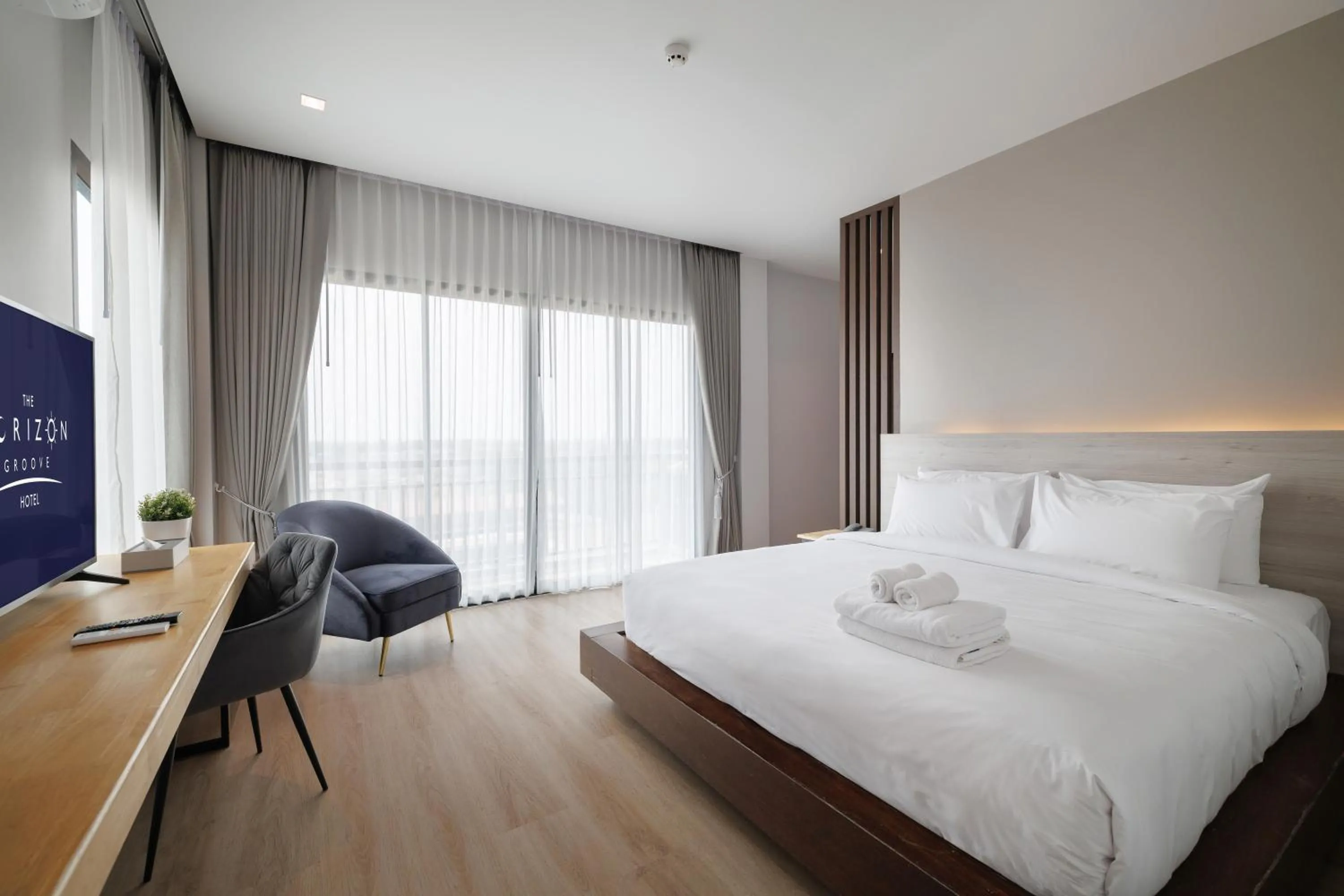 Bed in The Horizon Groove Hotel