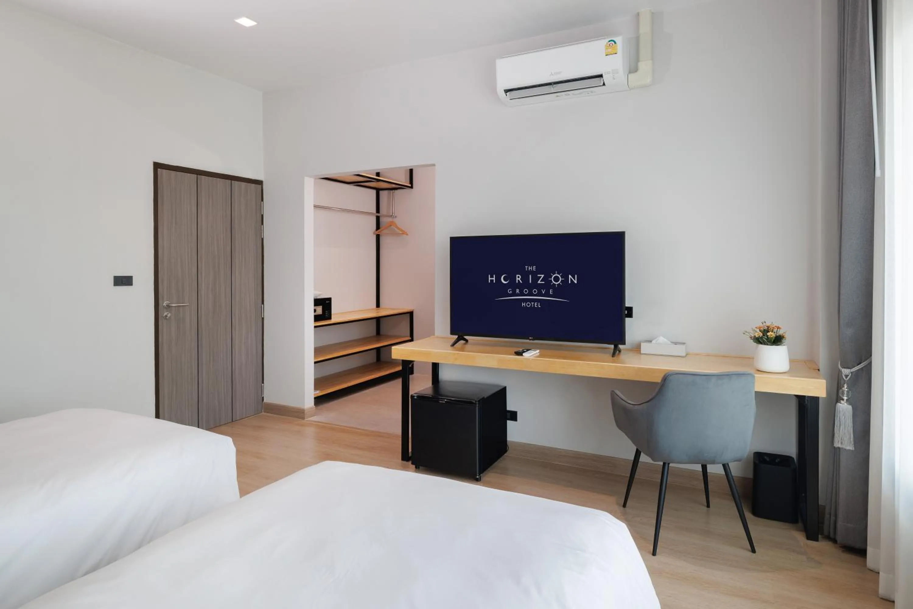 Bed in The Horizon Groove Hotel