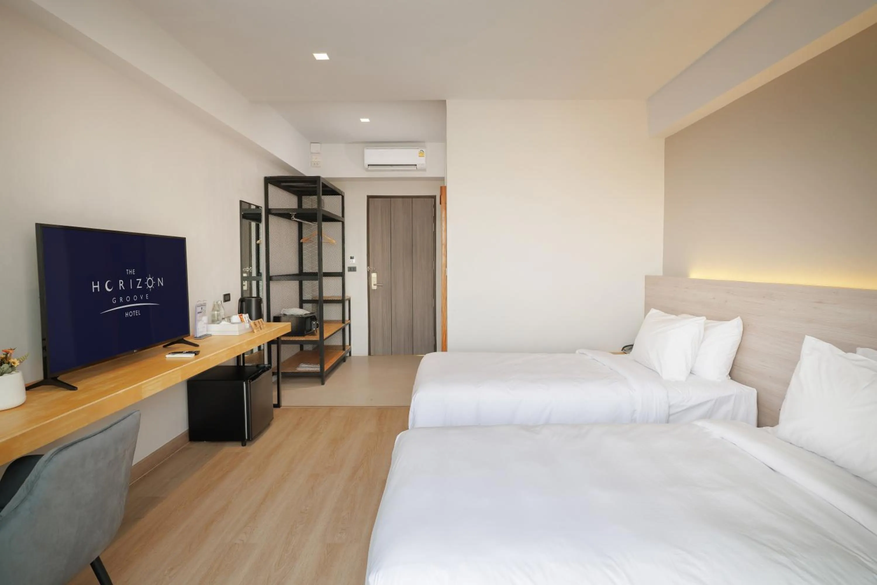 Bed in The Horizon Groove Hotel