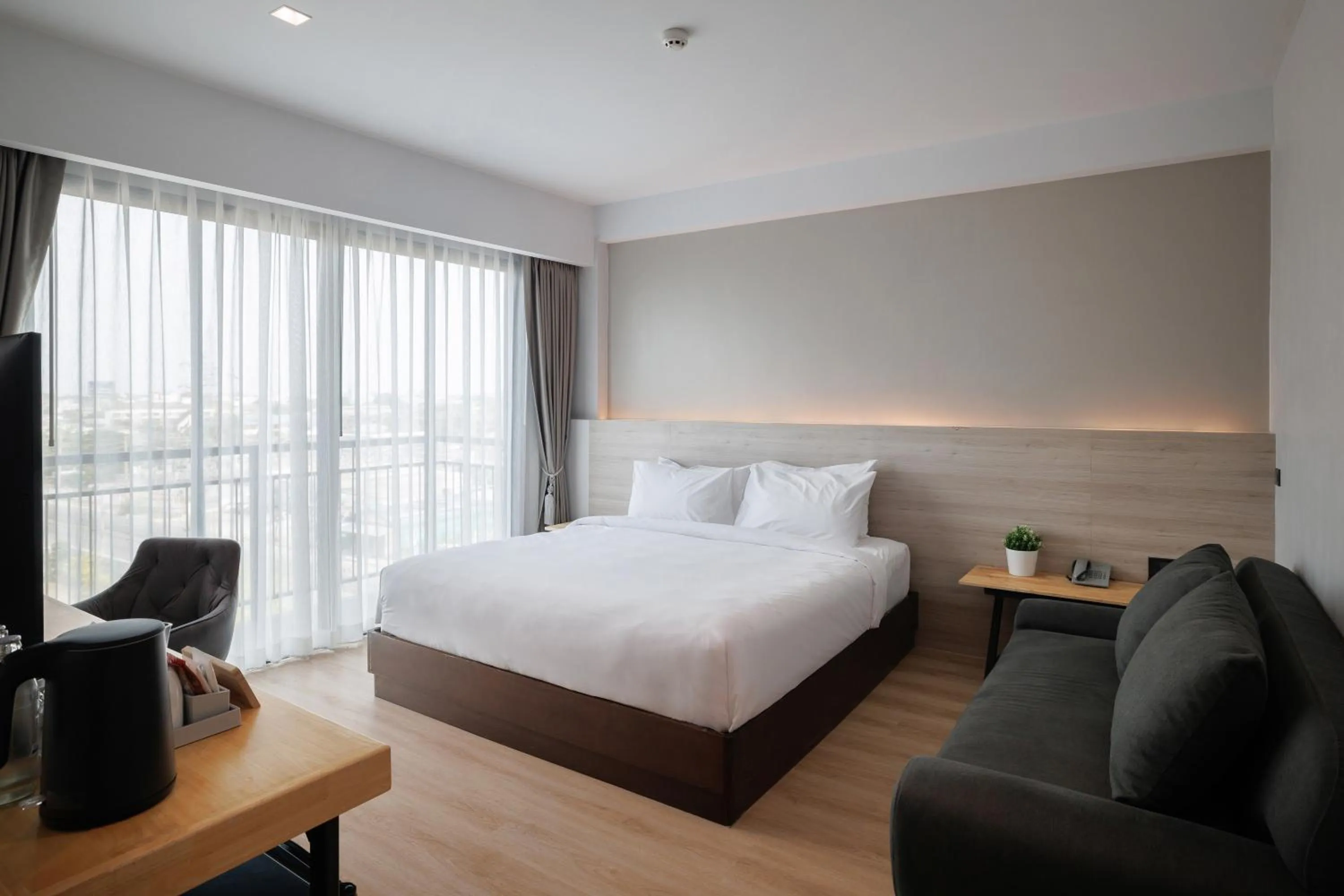 Bed in The Horizon Groove Hotel