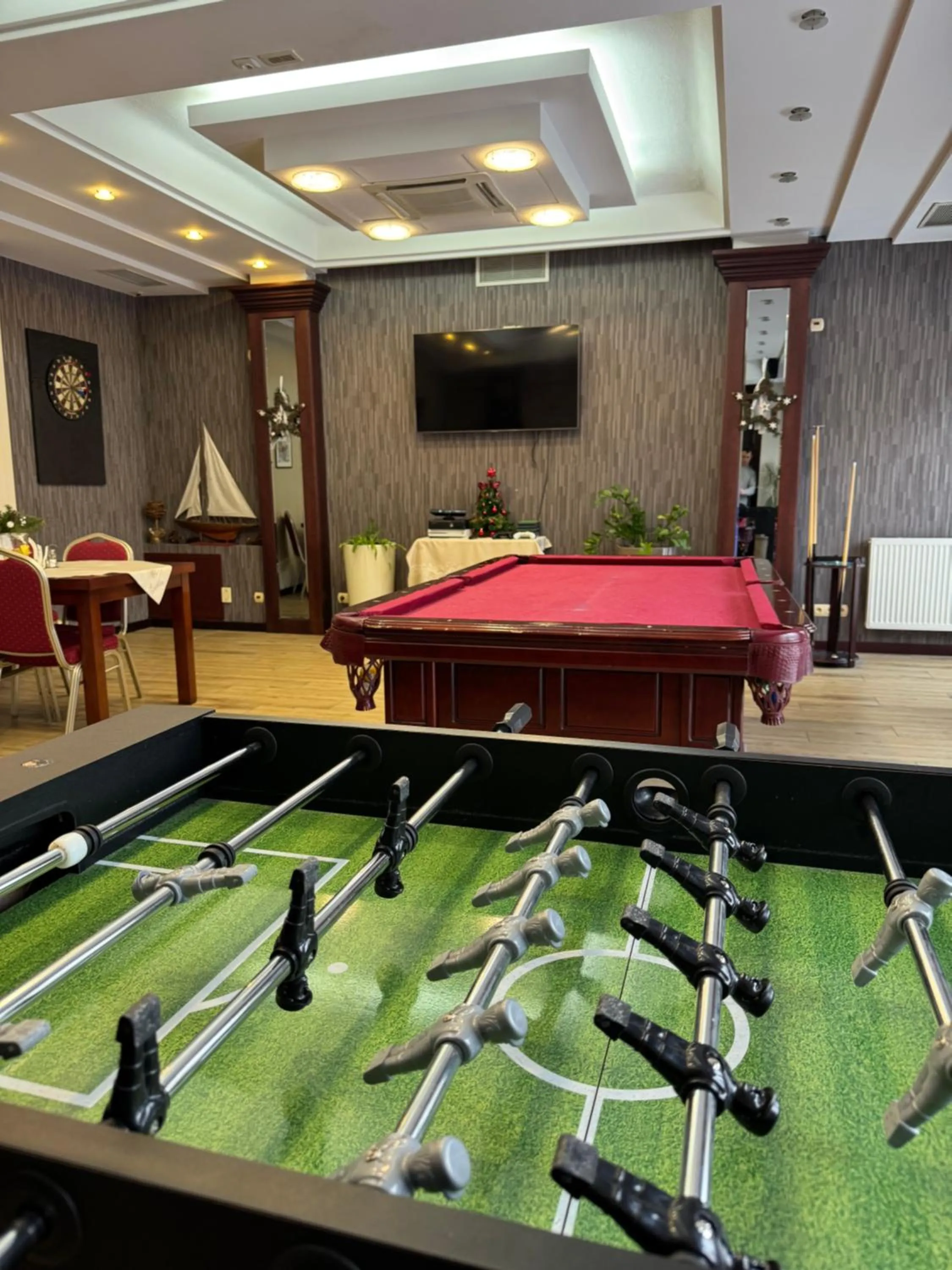 Communal lounge/ TV room in Hotel Rigga