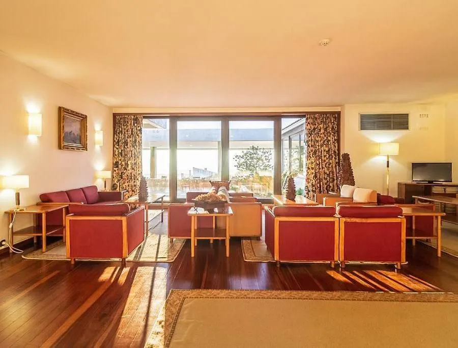 Communal lounge/ TV room in Hotel Fortaleza de Almeida by ASITE Hotels