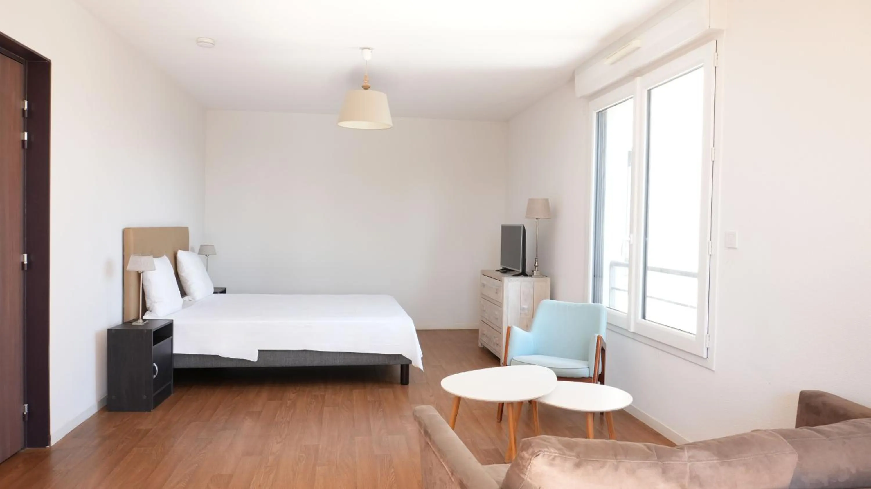 Bed in Zenao Appart'Hotel