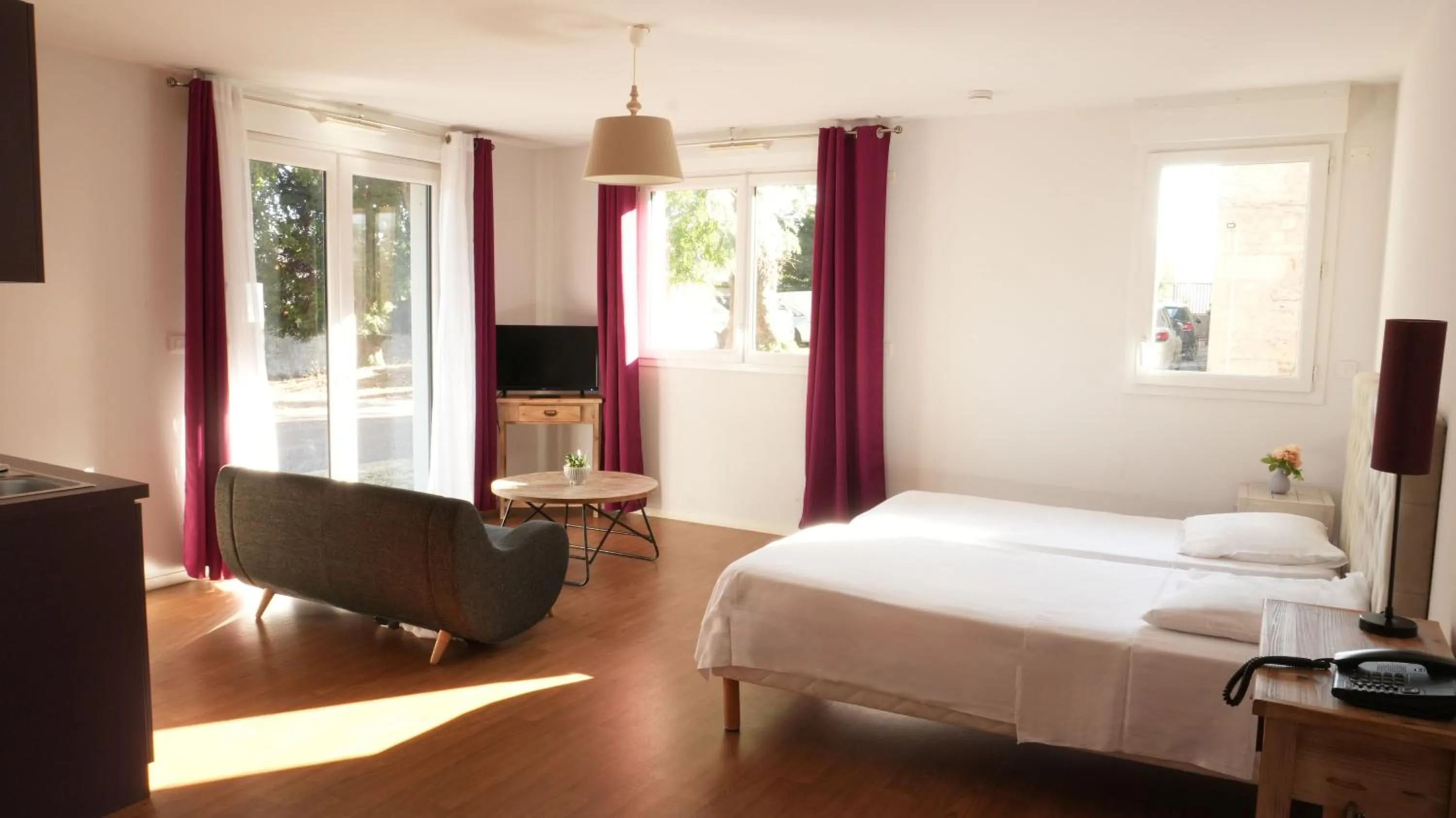 Bed in Zenao Appart'Hotel