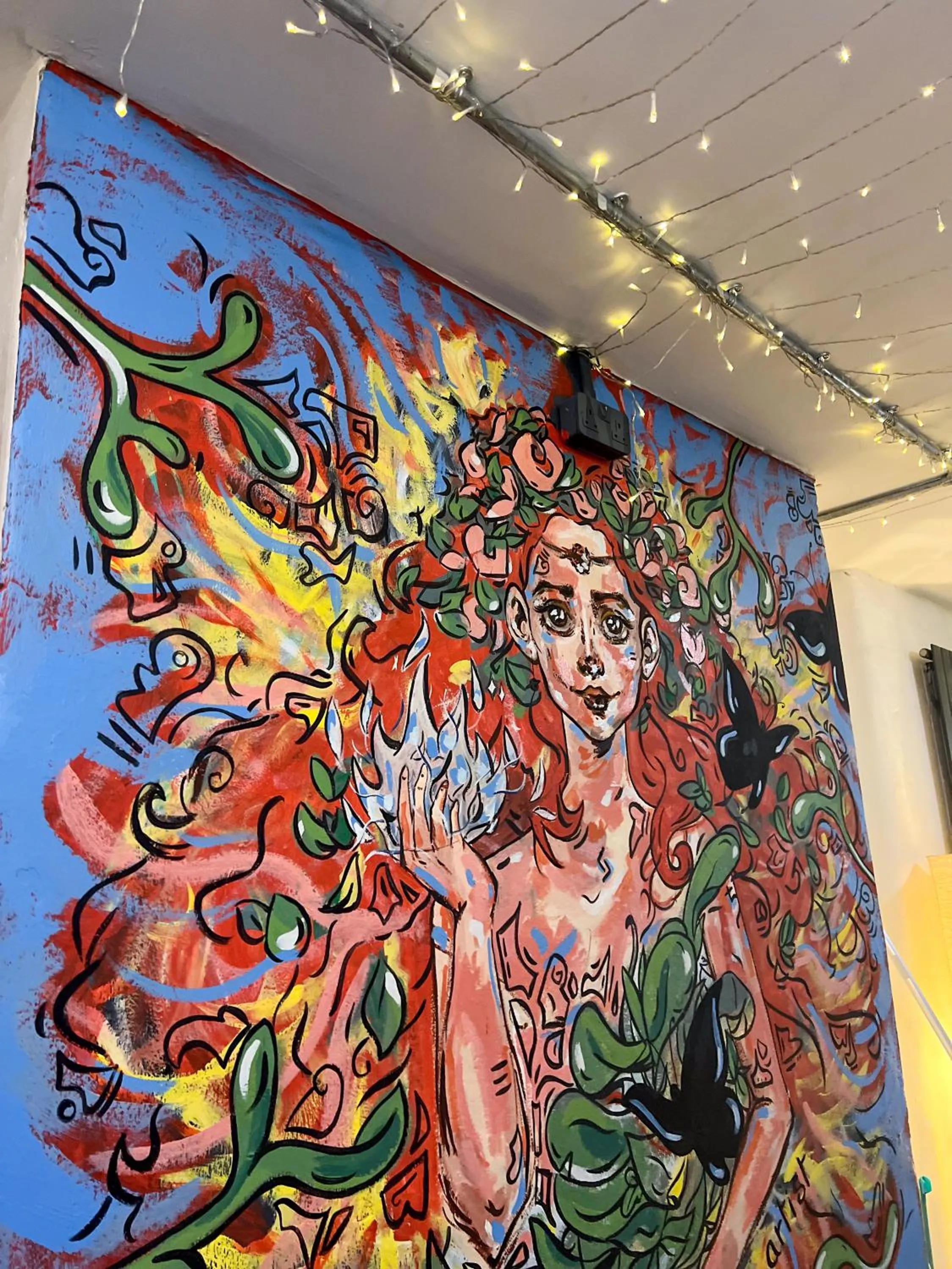 Communal lounge/ TV room in Prime Backpackers Angel