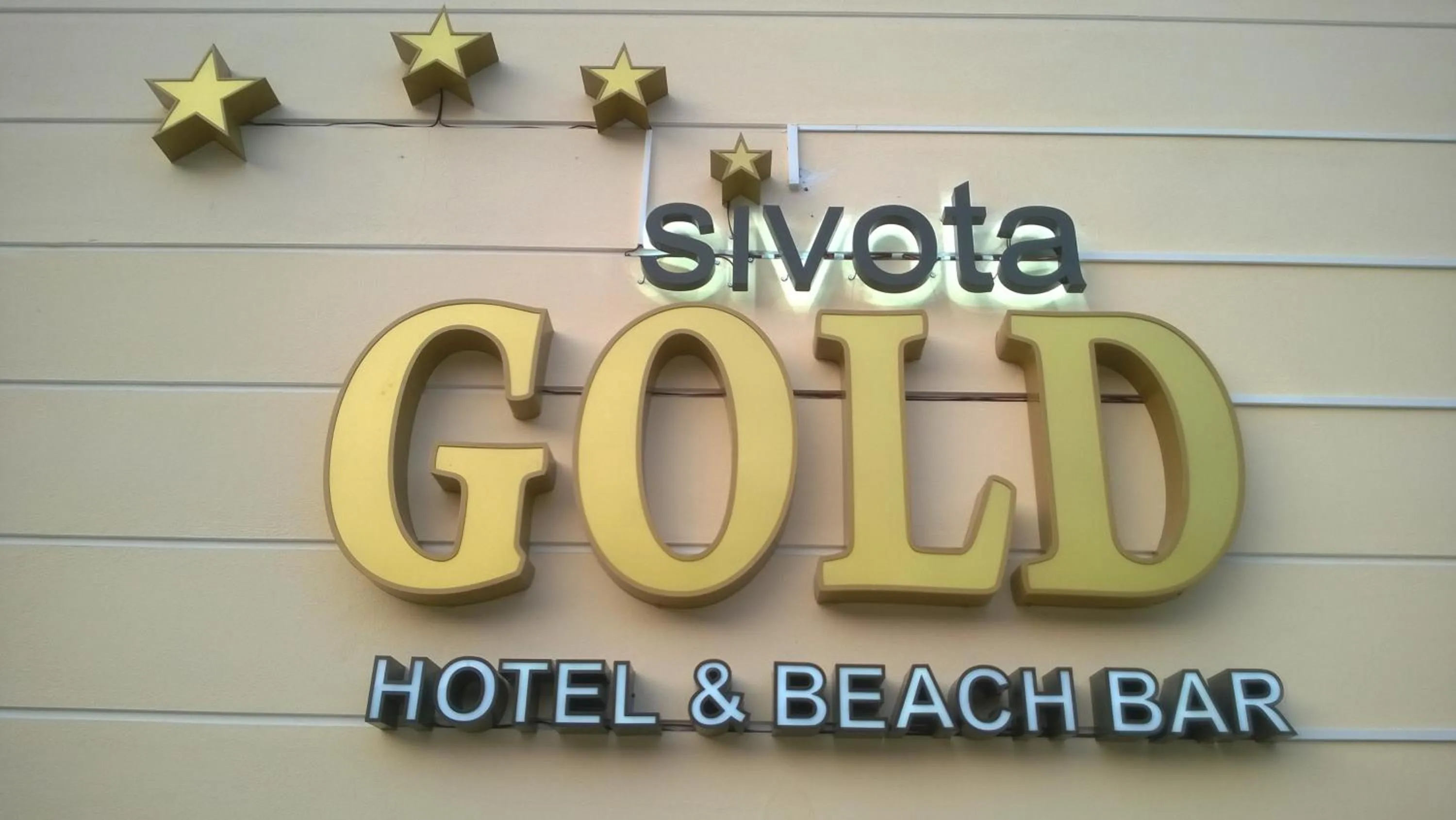 Property logo or sign in Sivota Gold