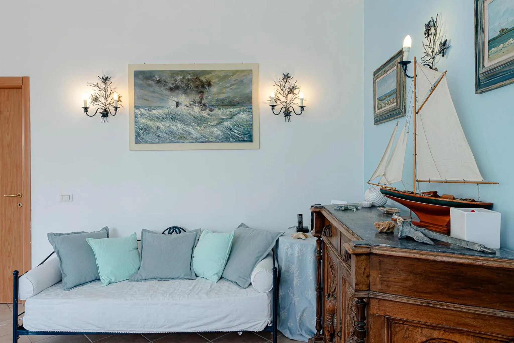 Communal lounge/ TV room in Villino dei Coralli