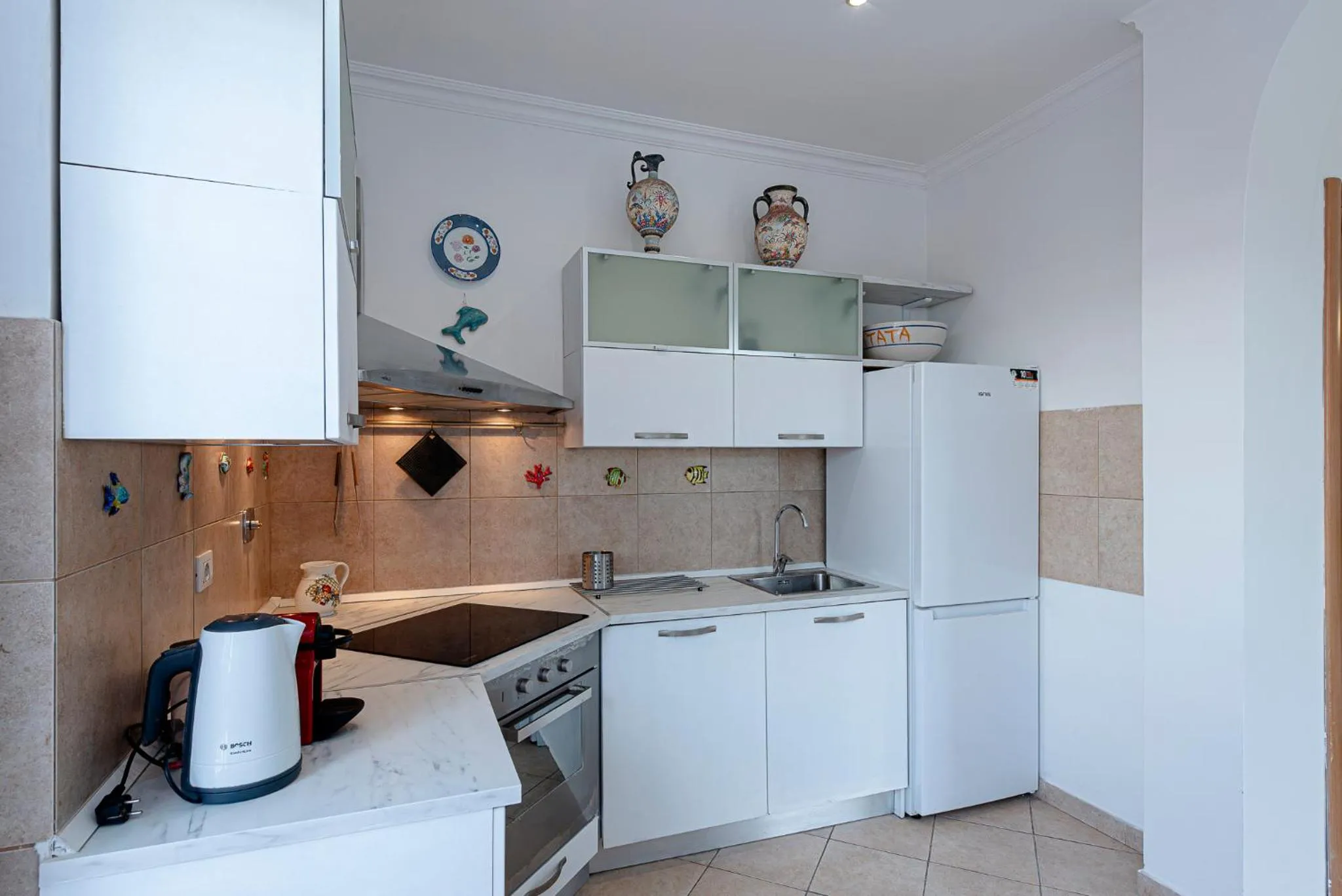 Kitchen or kitchenette in Villino dei Coralli