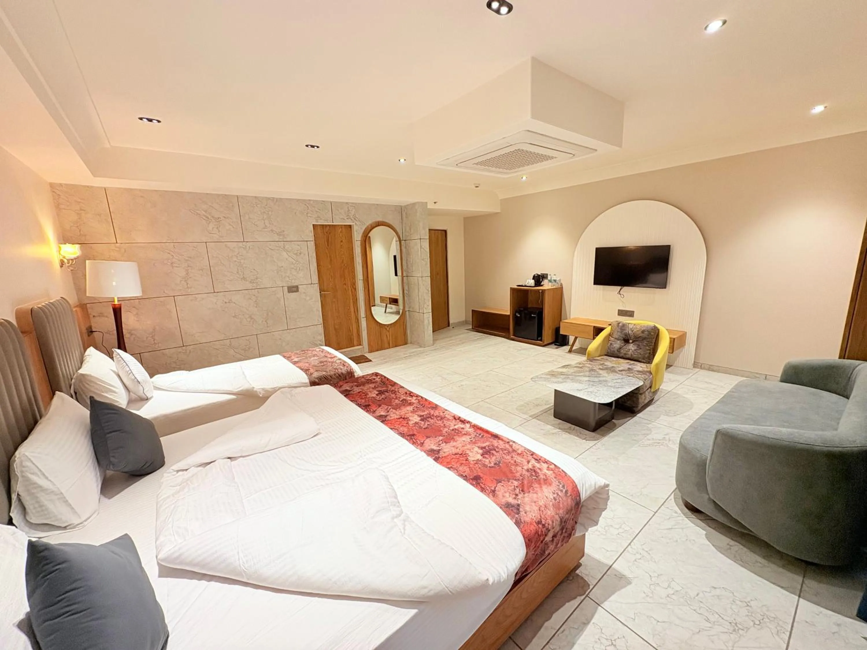 Communal lounge/ TV room, Bed in The Parterre - SG Highway Ahmedabad