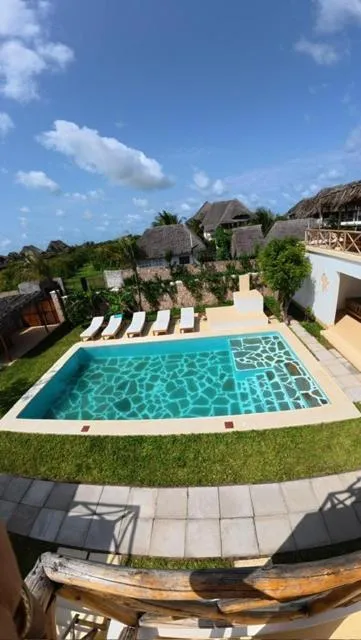 Swimming pool in TATU INN Boutique Hotel WATAMU