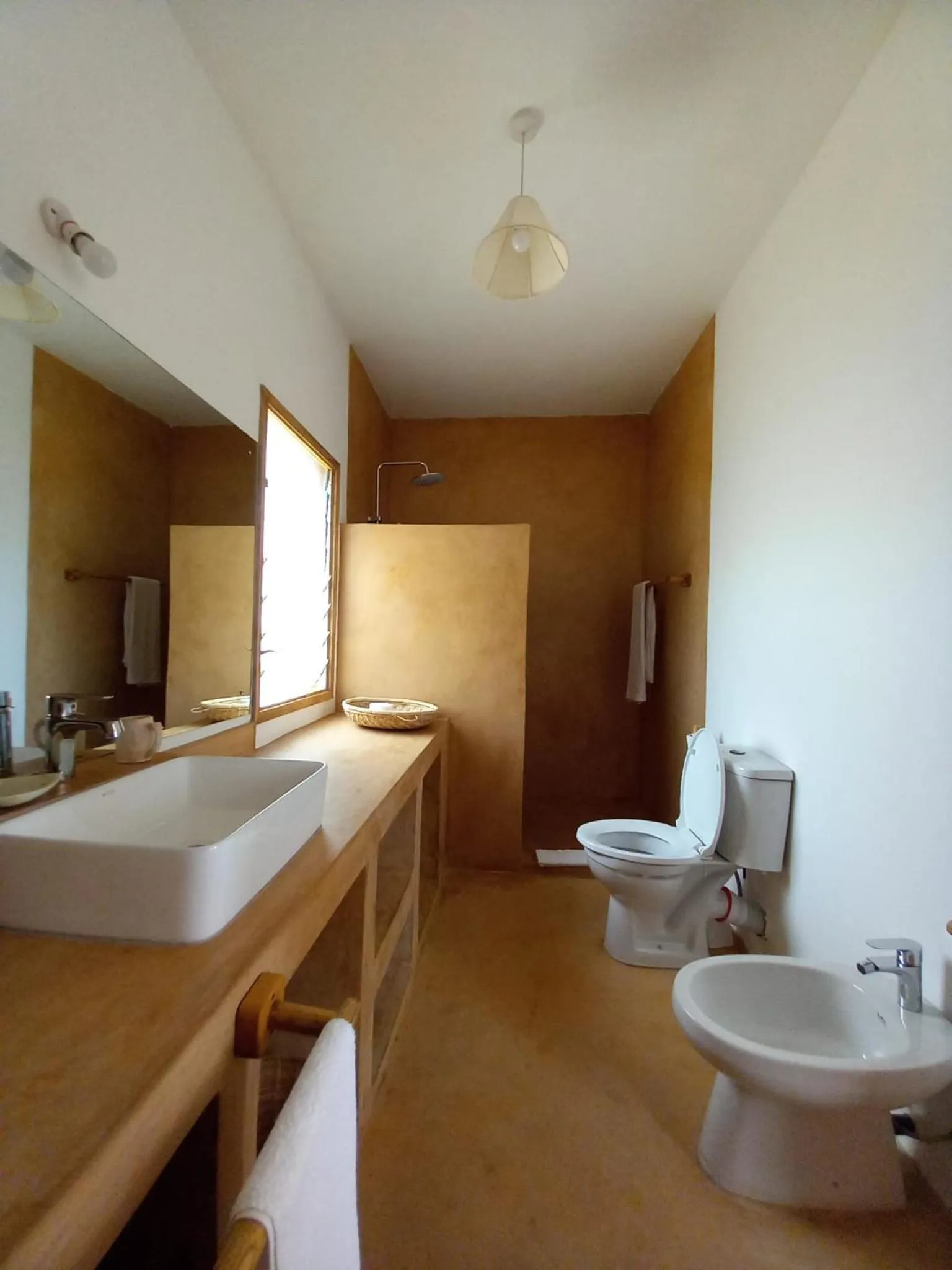 Toilet in TATU INN Boutique Hotel WATAMU