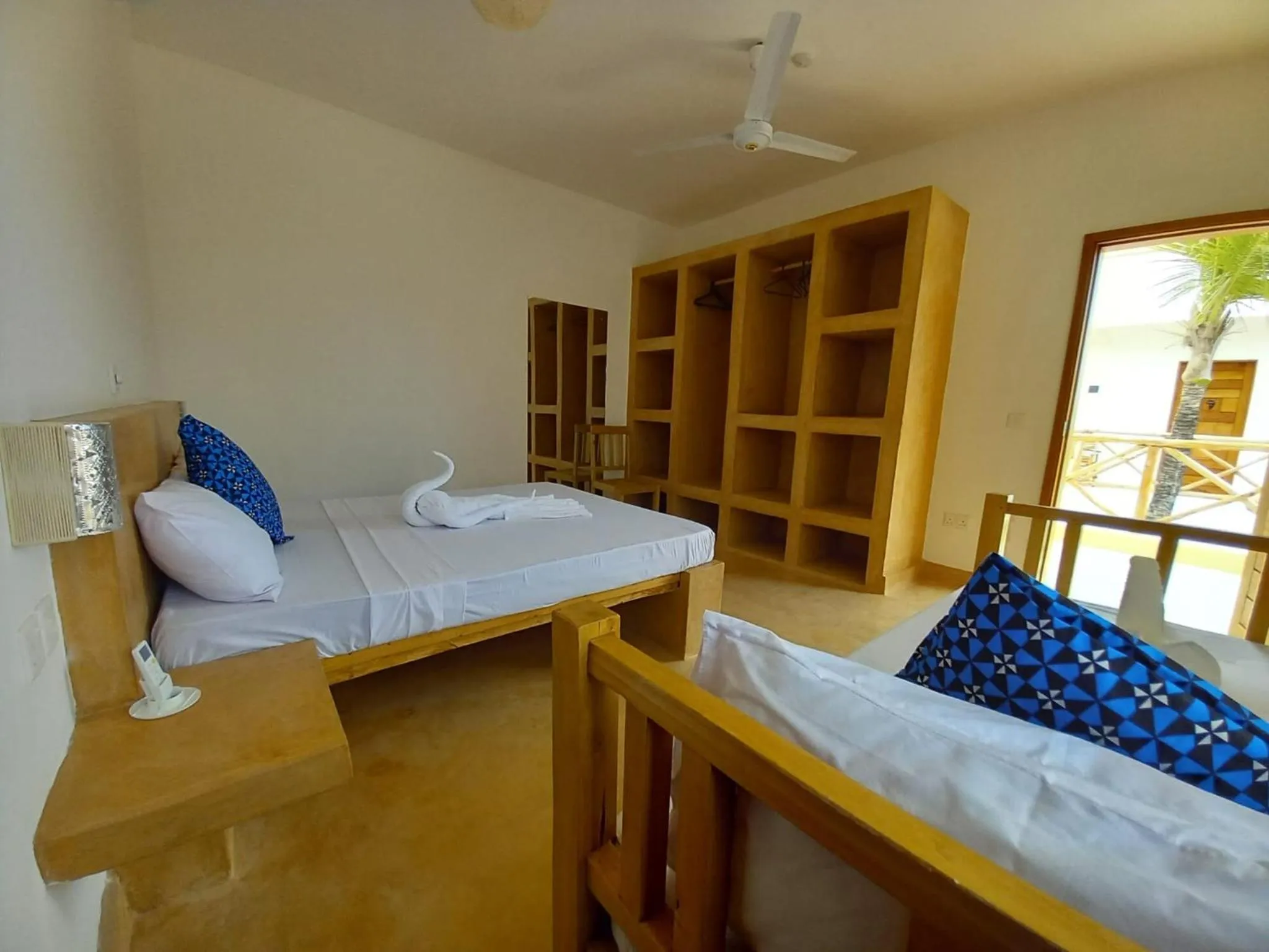 Photo of the whole room, Bed in TATU INN Boutique Hotel WATAMU