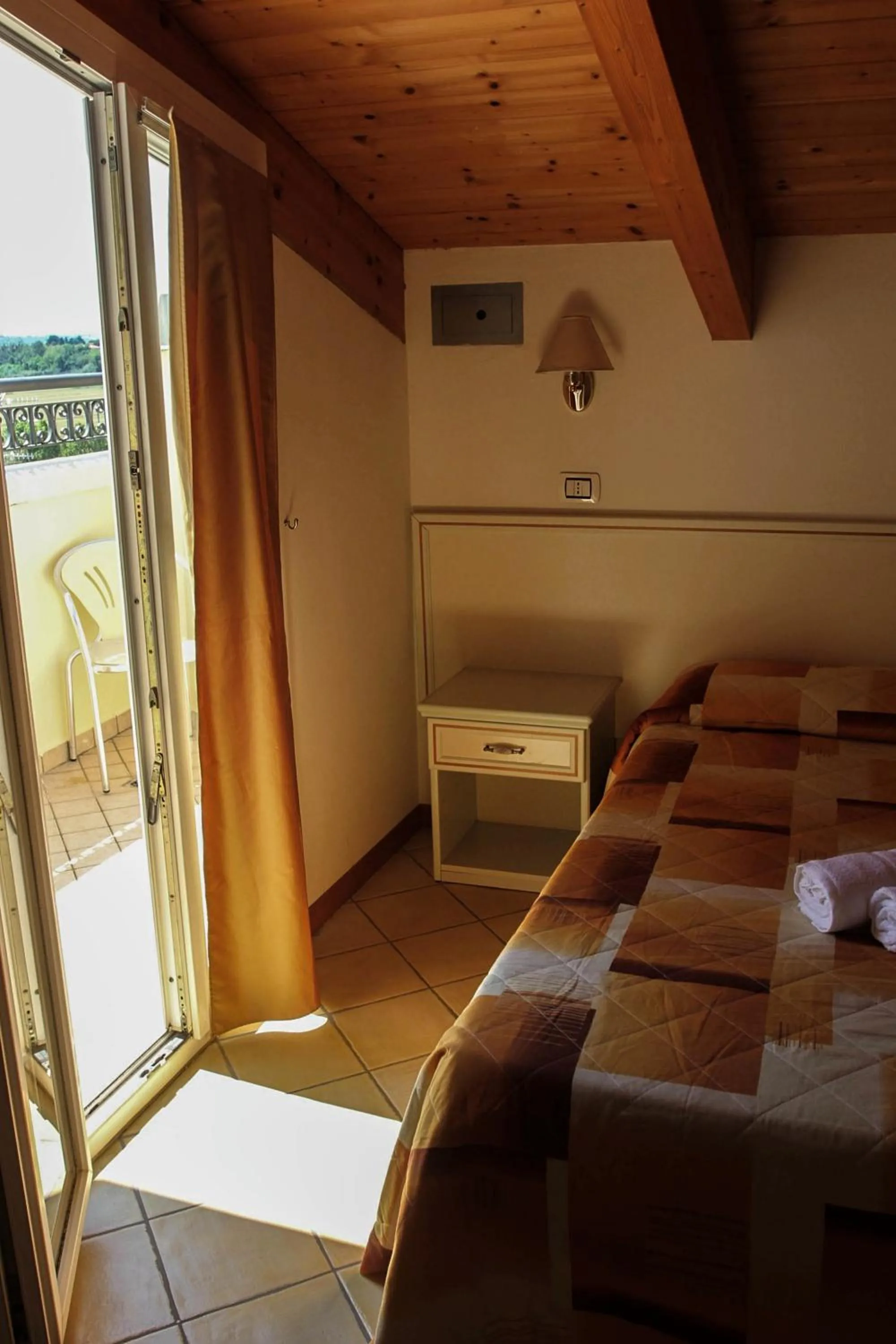 Bed in Hotel Ariston