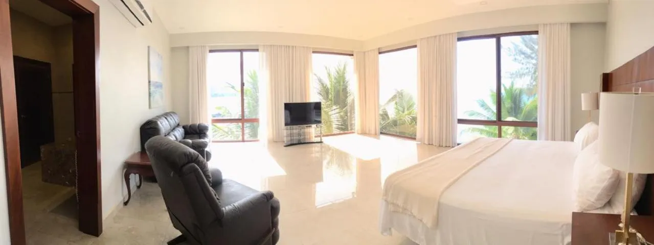 Bed in Paraiso Rainforest and Beach Hotel