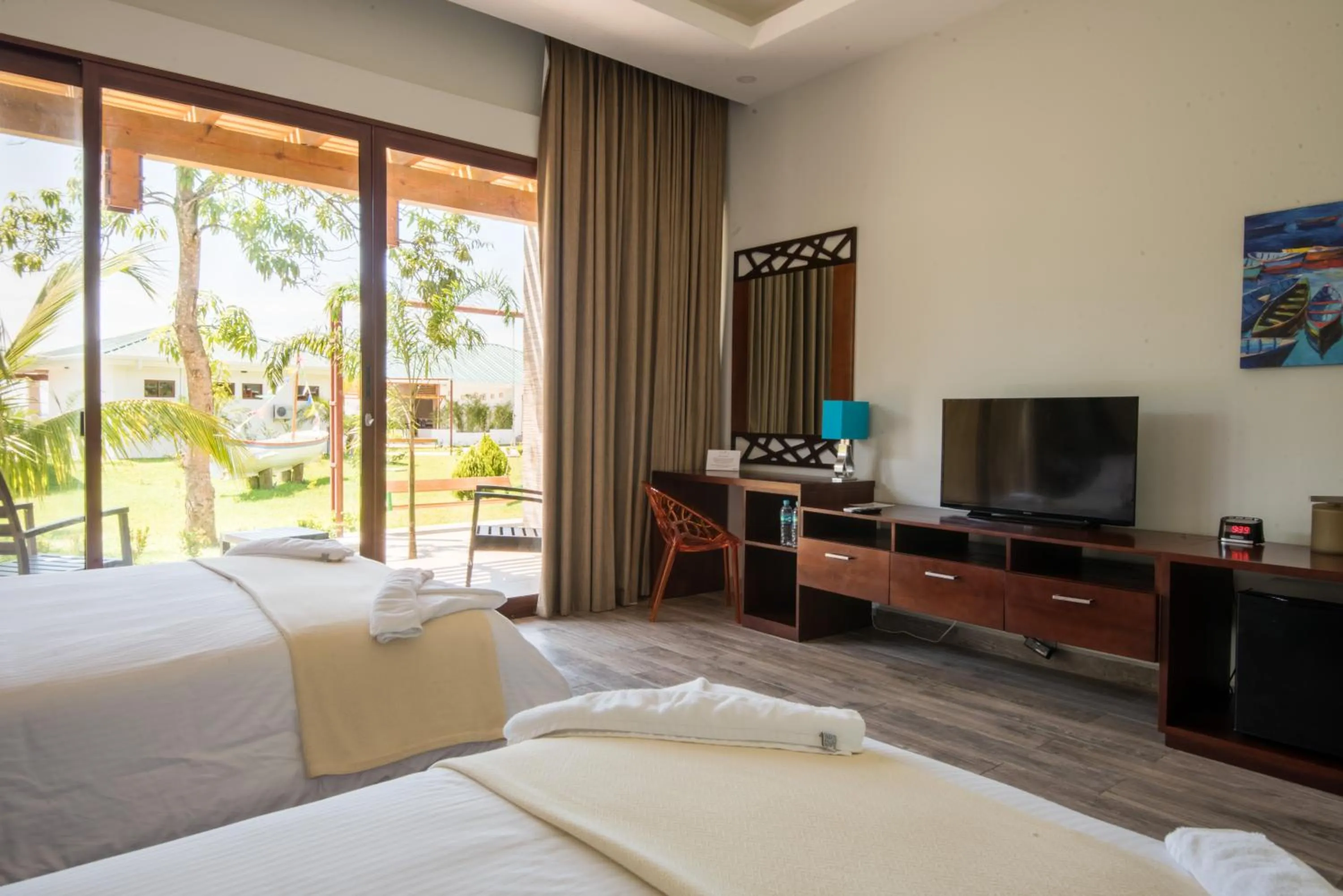 Bed in Paraiso Rainforest and Beach Hotel