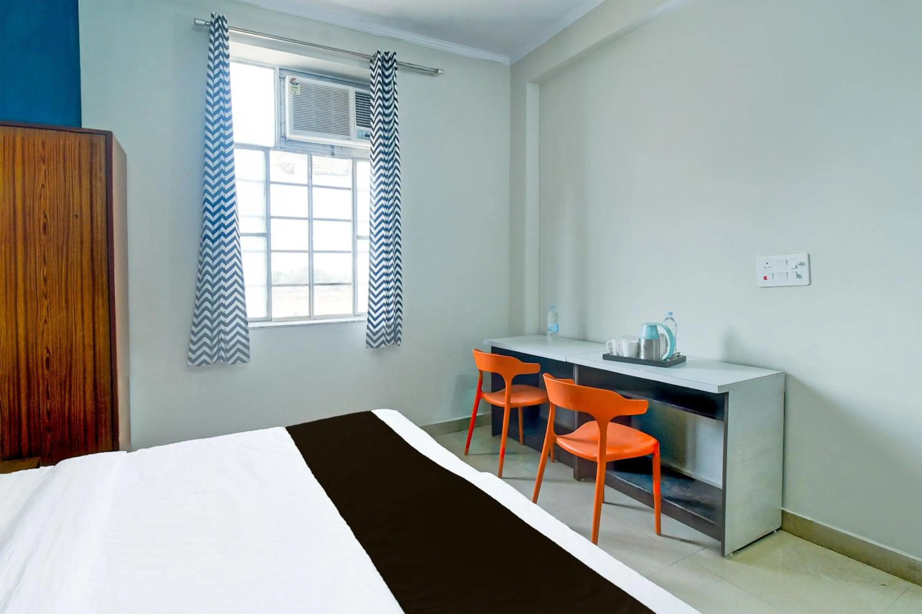 Bedroom in Hotel O SS