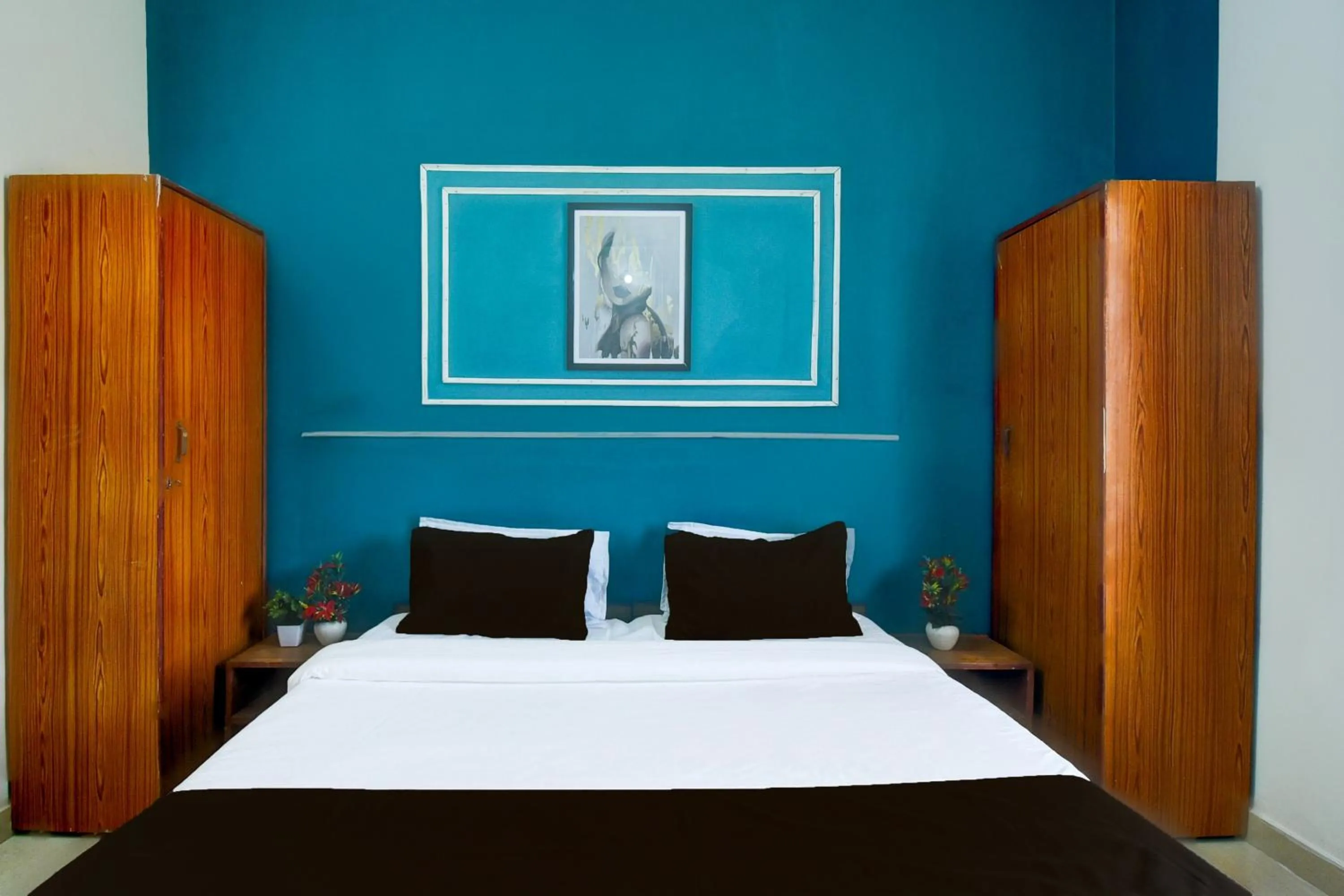 Bedroom in Hotel O SS