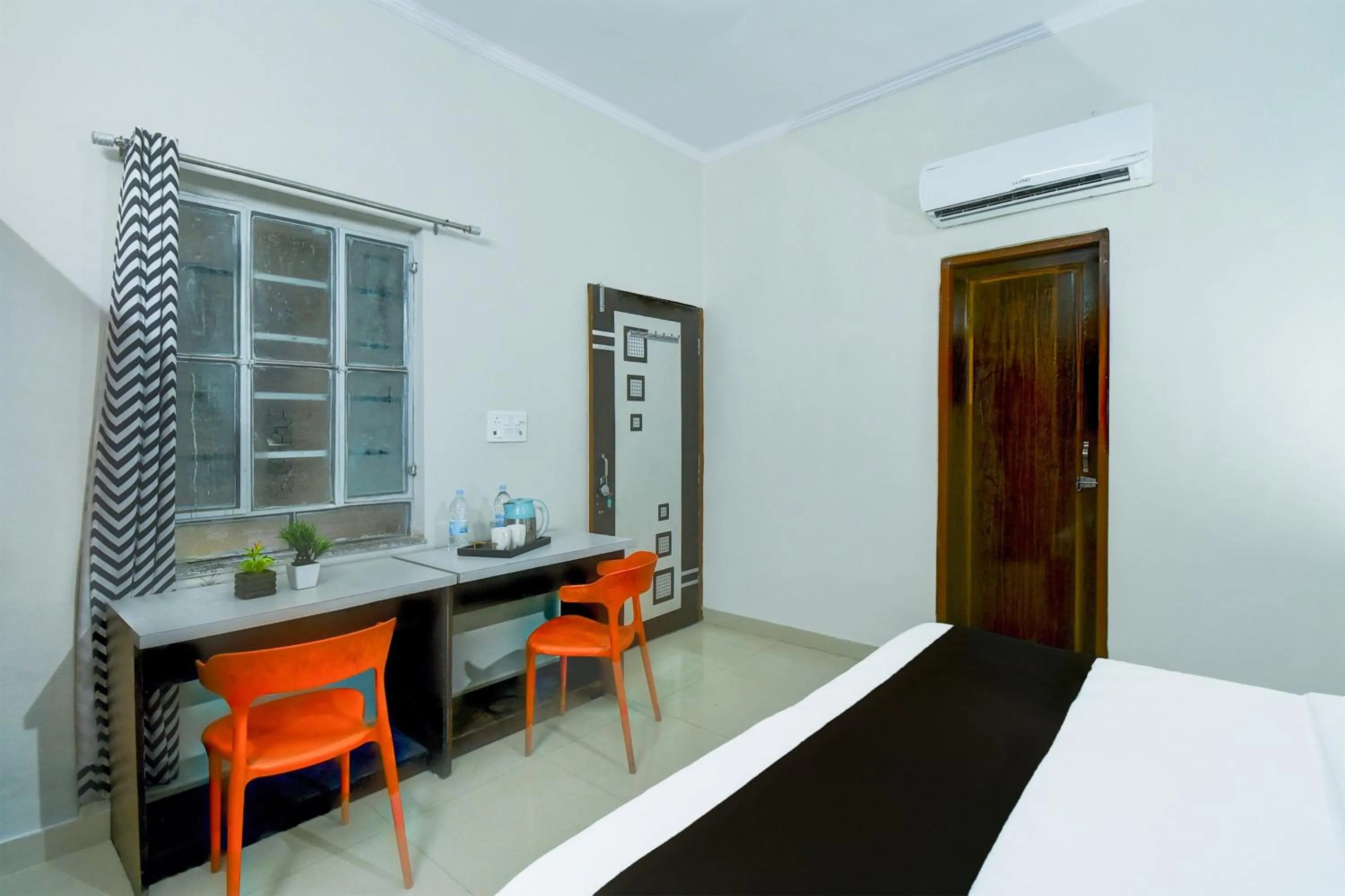 Bedroom in Hotel O SS