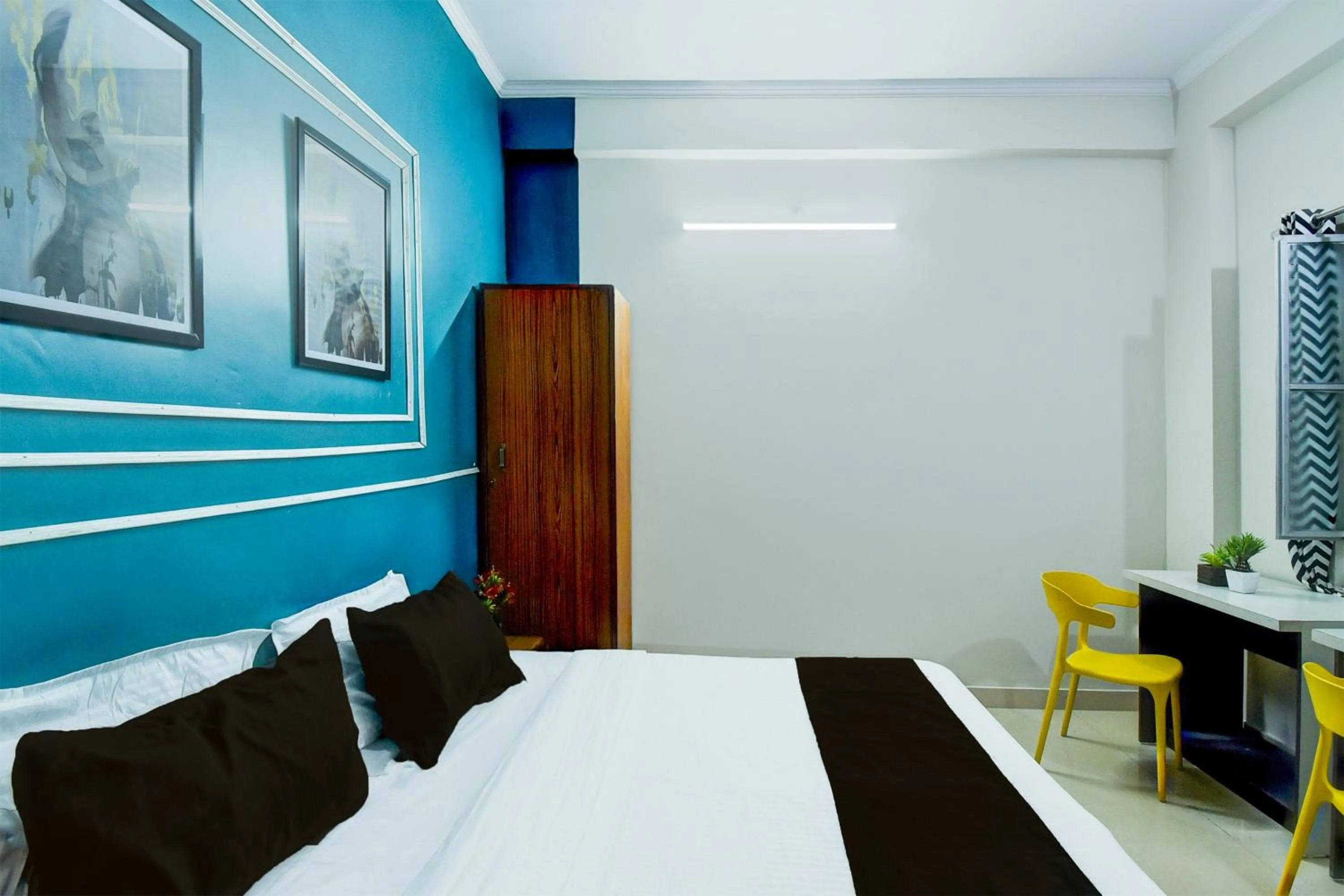 Bedroom in Hotel O SS