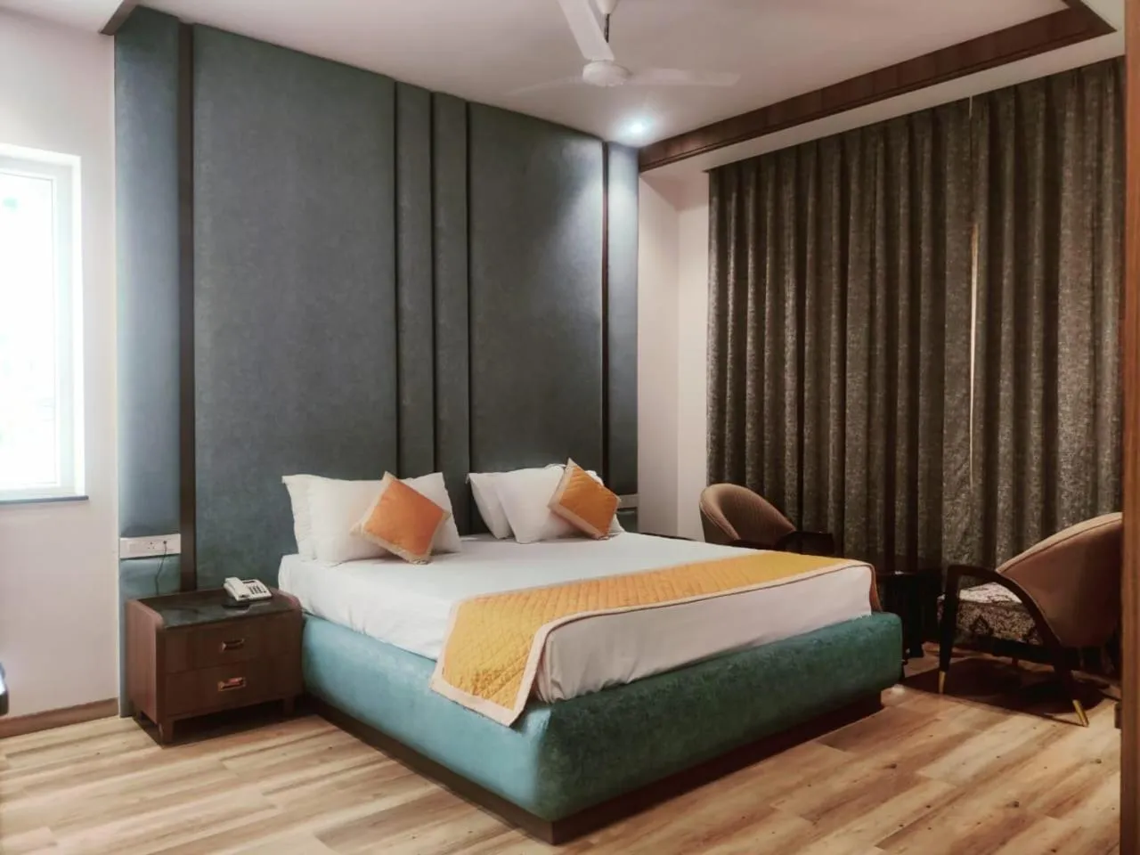 Bed in Nirvana Grand Hotel & Resort