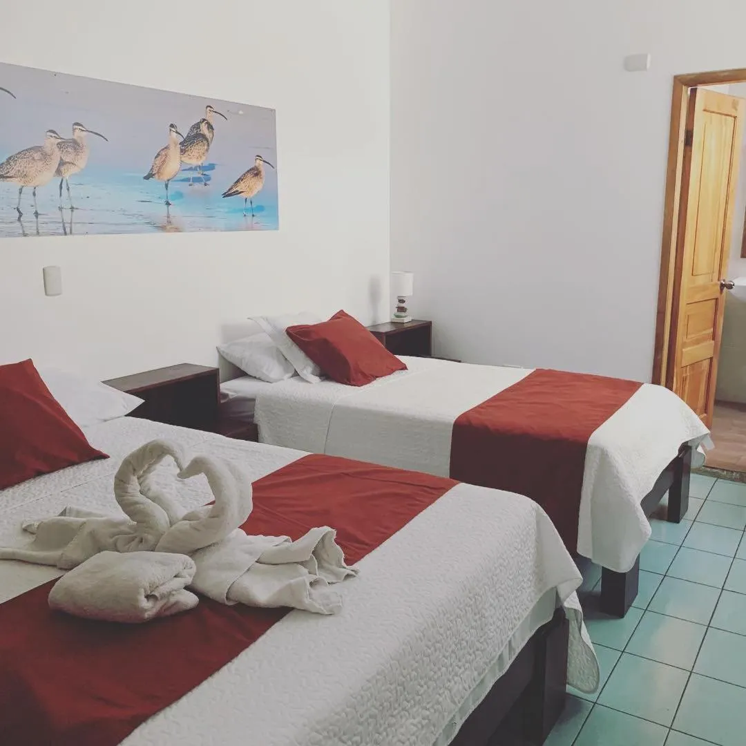 Bed in Hostal Costa del Pacifico