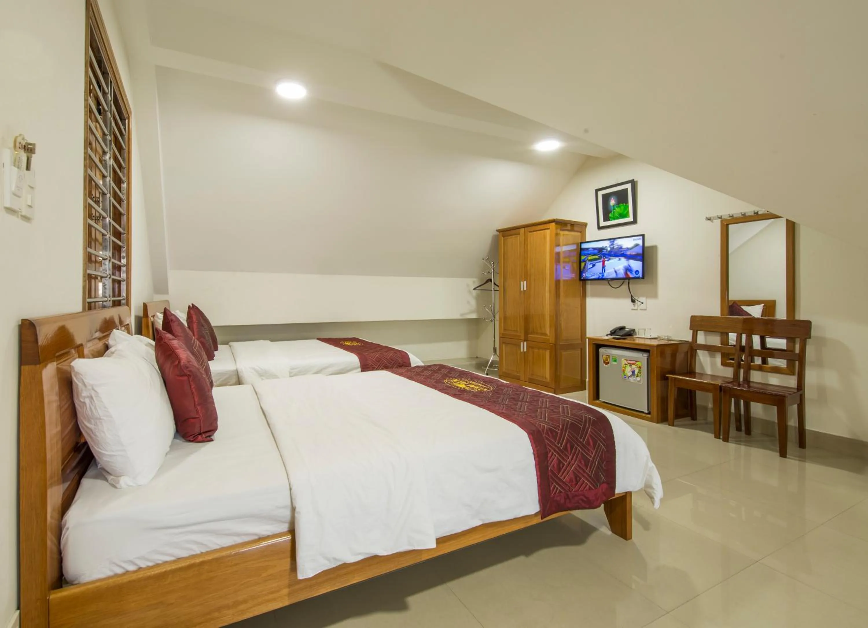 Photo of the whole room, Bed in Dam Tien Hotel